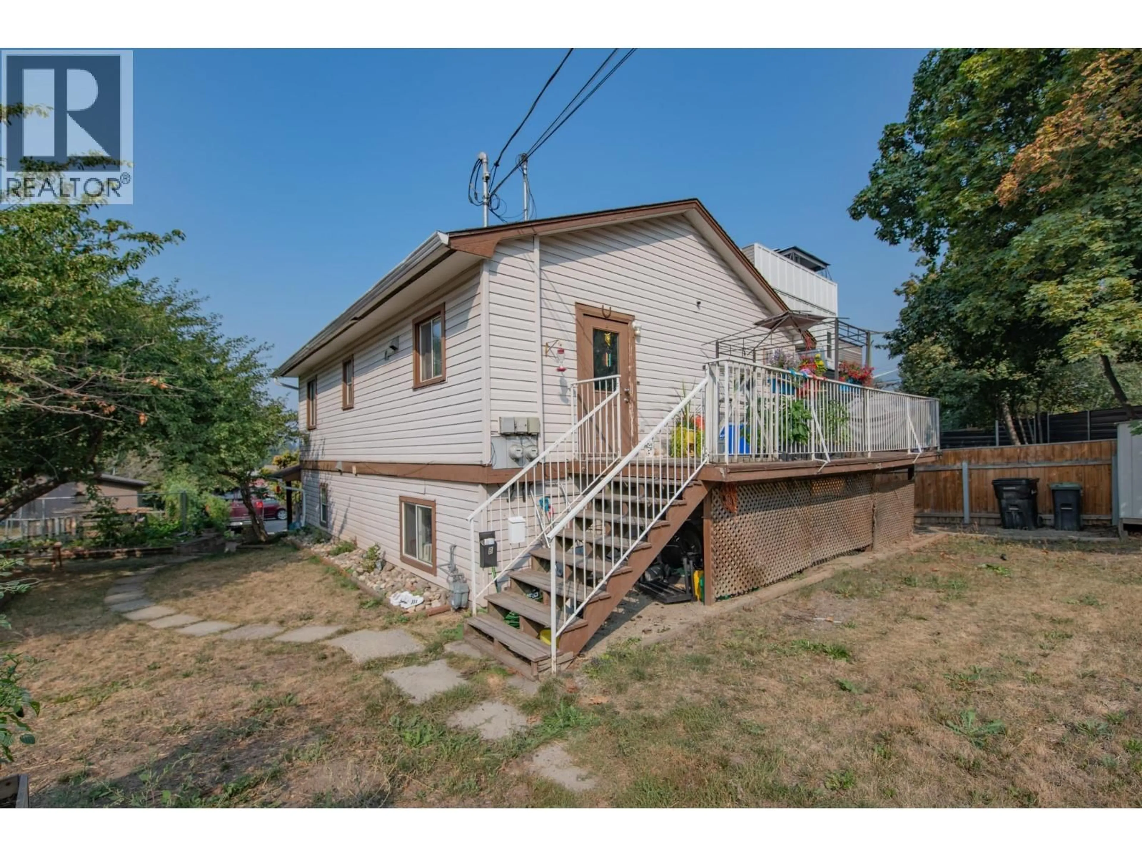 A pic from outside/outdoor area/front of a property/back of a property/a pic from drone, street for 3908 PLEASANT VALLEY ROAD, Vernon British Columbia V1T4M2