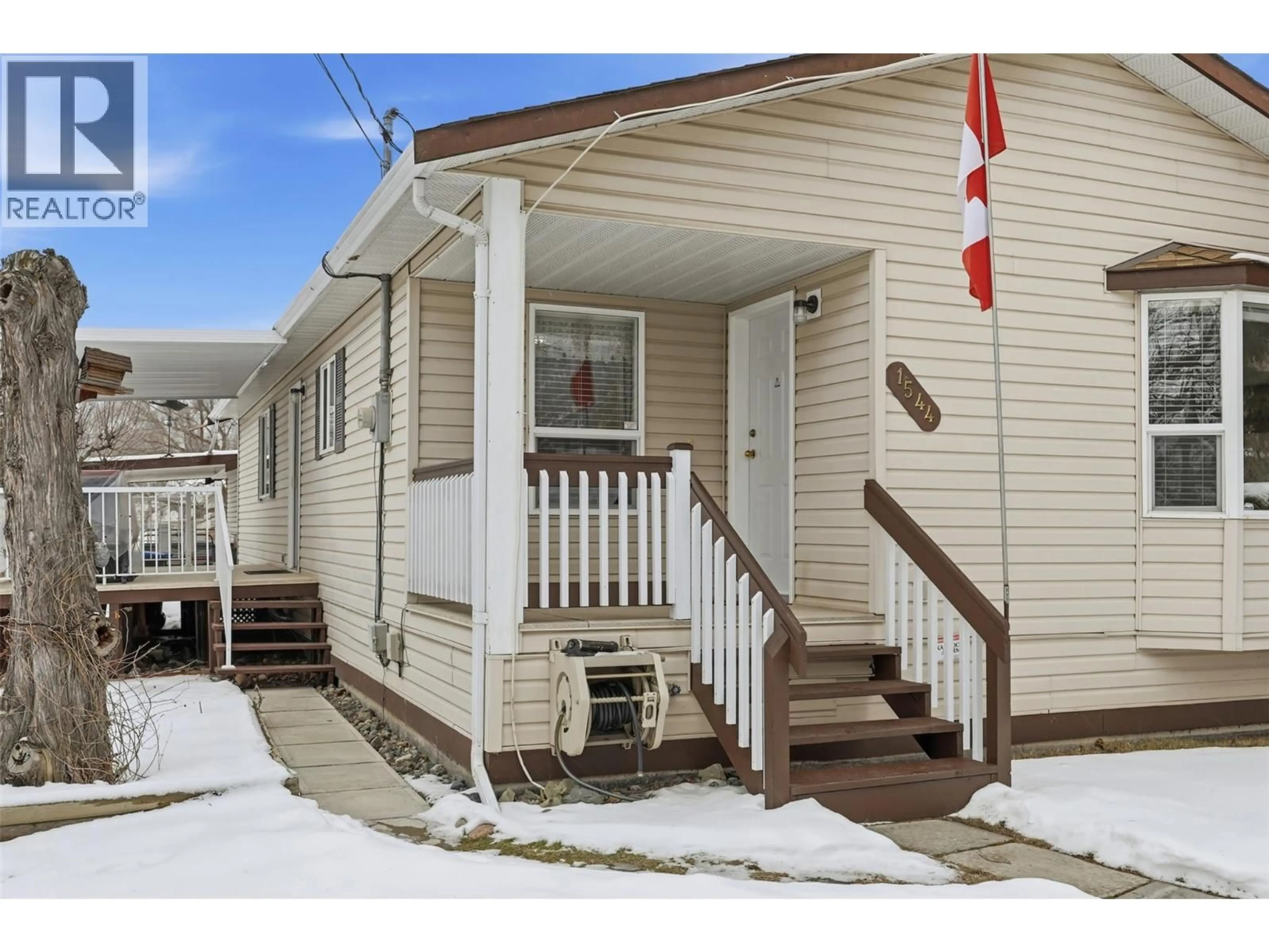 Home with vinyl exterior material, street for 1544 CANFORD AVENUE, Merritt British Columbia V1K1B8