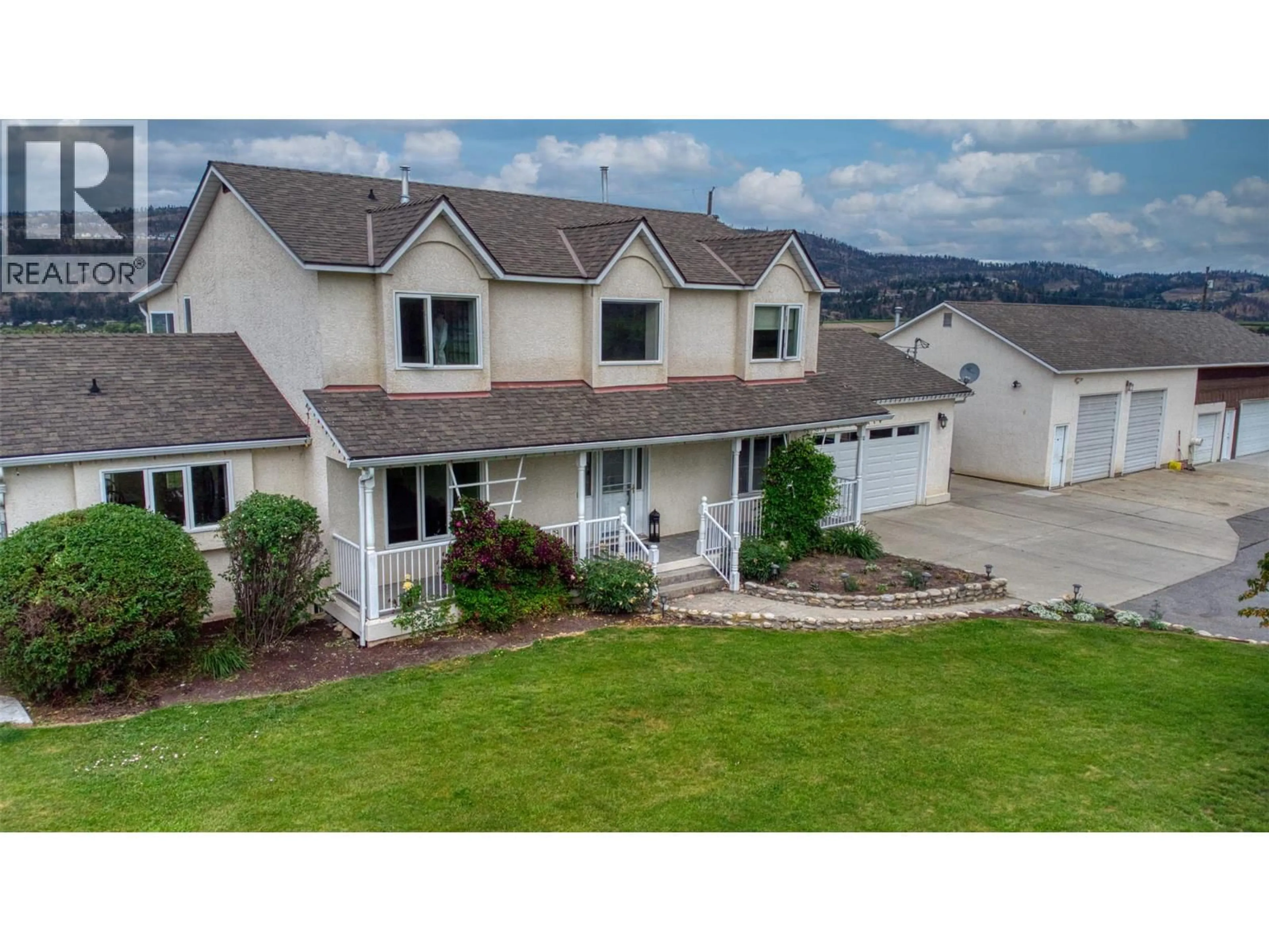 A pic from outside/outdoor area/front of a property/back of a property/a pic from drone, unknown for 2547 SEXSMITH ROAD, Kelowna British Columbia V1V2G6