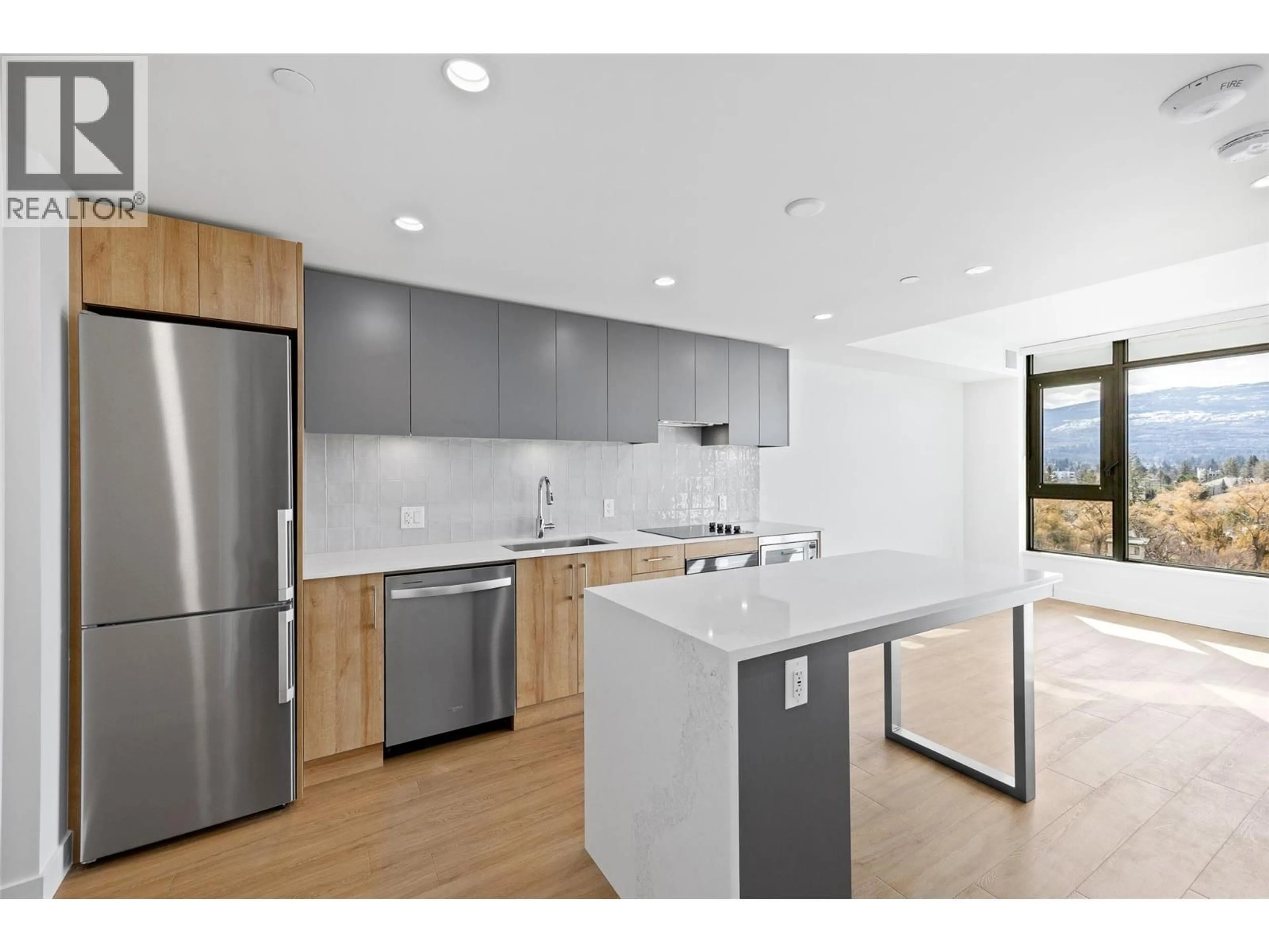 Open concept kitchen, unknown for 705 - 3699 CAPOZZI ROAD, Kelowna British Columbia V1W3L2
