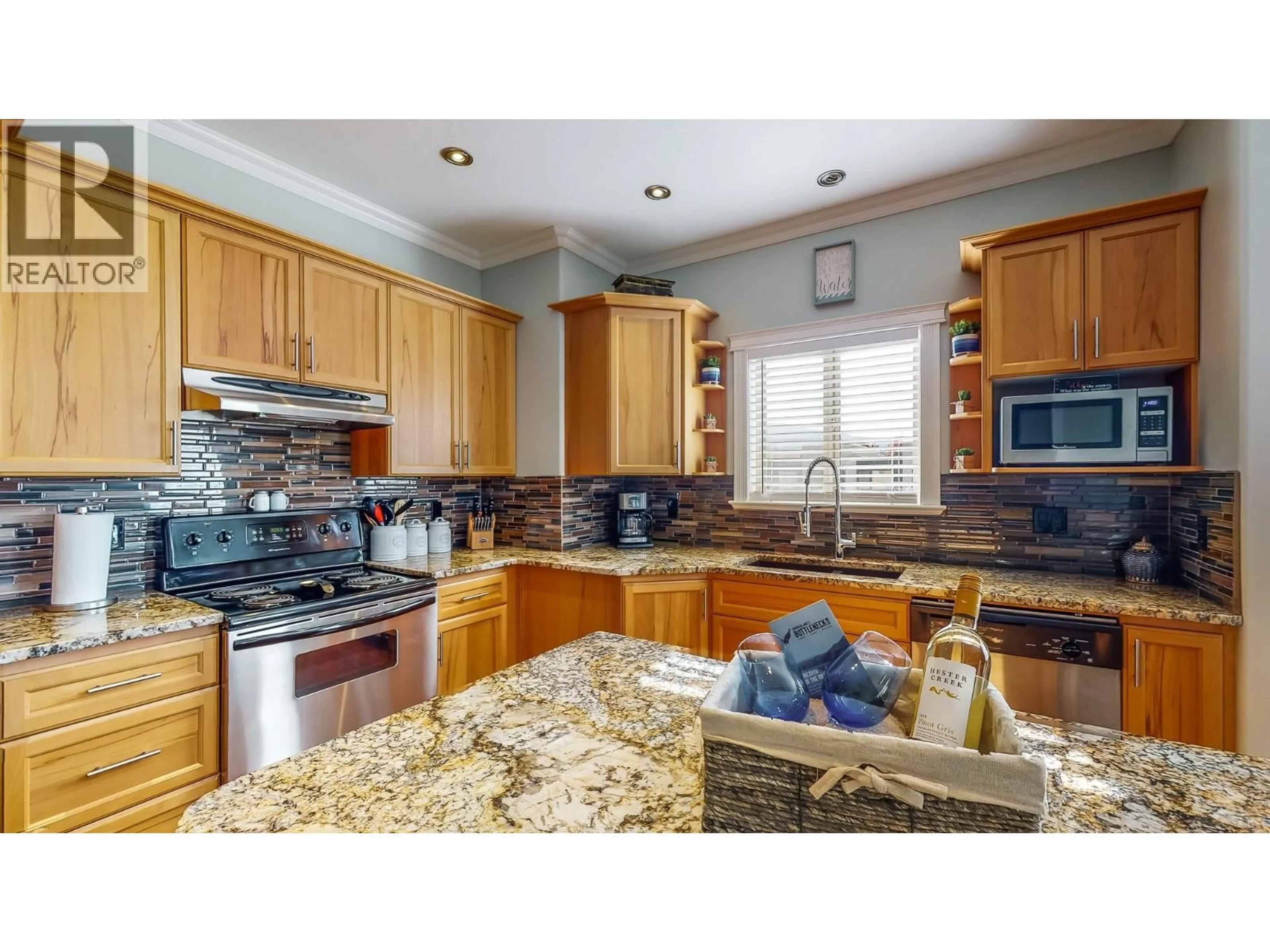 Open concept kitchen, ceramic/tile floor for 202 - 144 POWER STREET, Penticton British Columbia V2A5W9