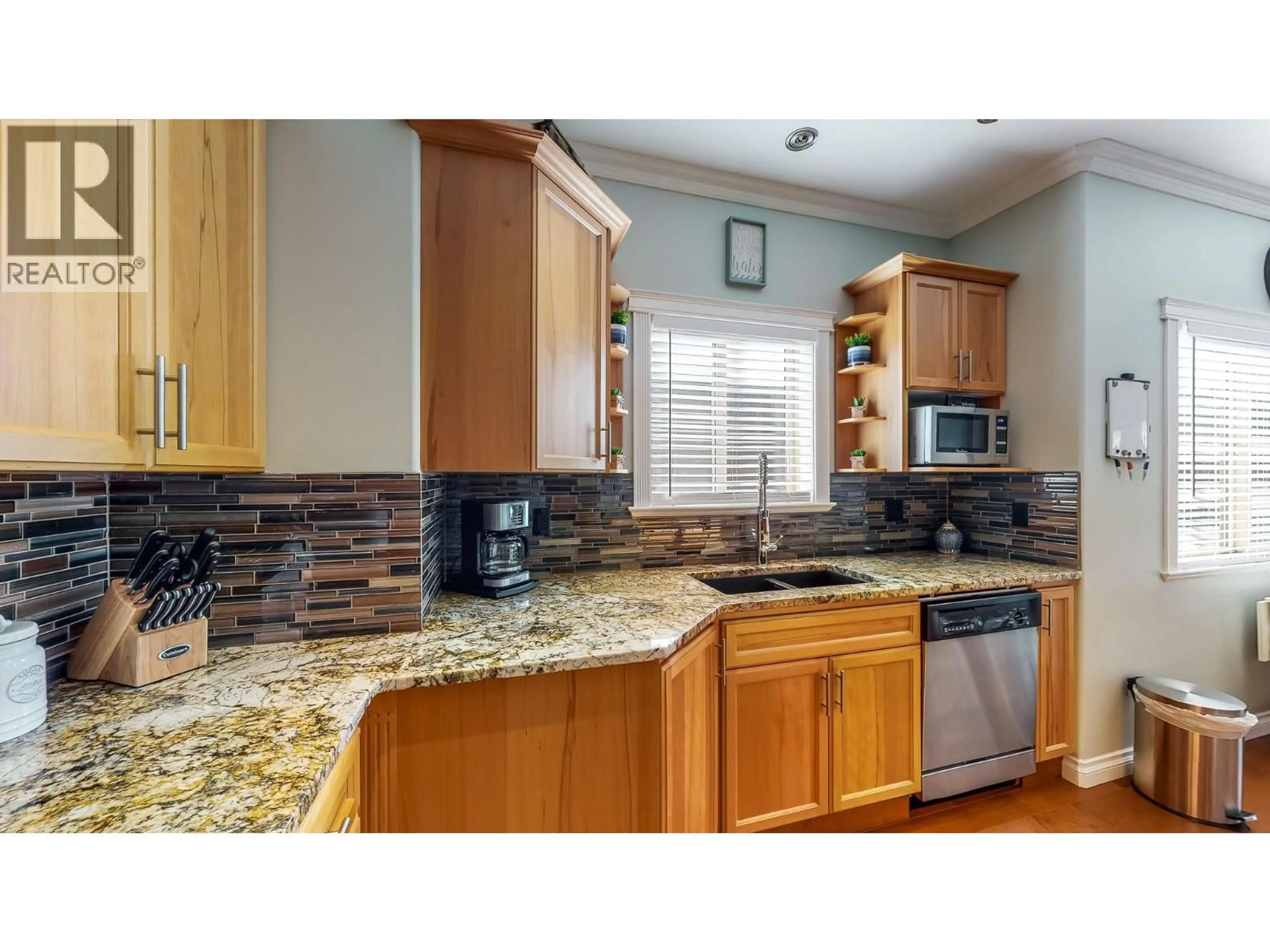 Open concept kitchen, ceramic/tile floor for 202 - 144 POWER STREET, Penticton British Columbia V2A5W9