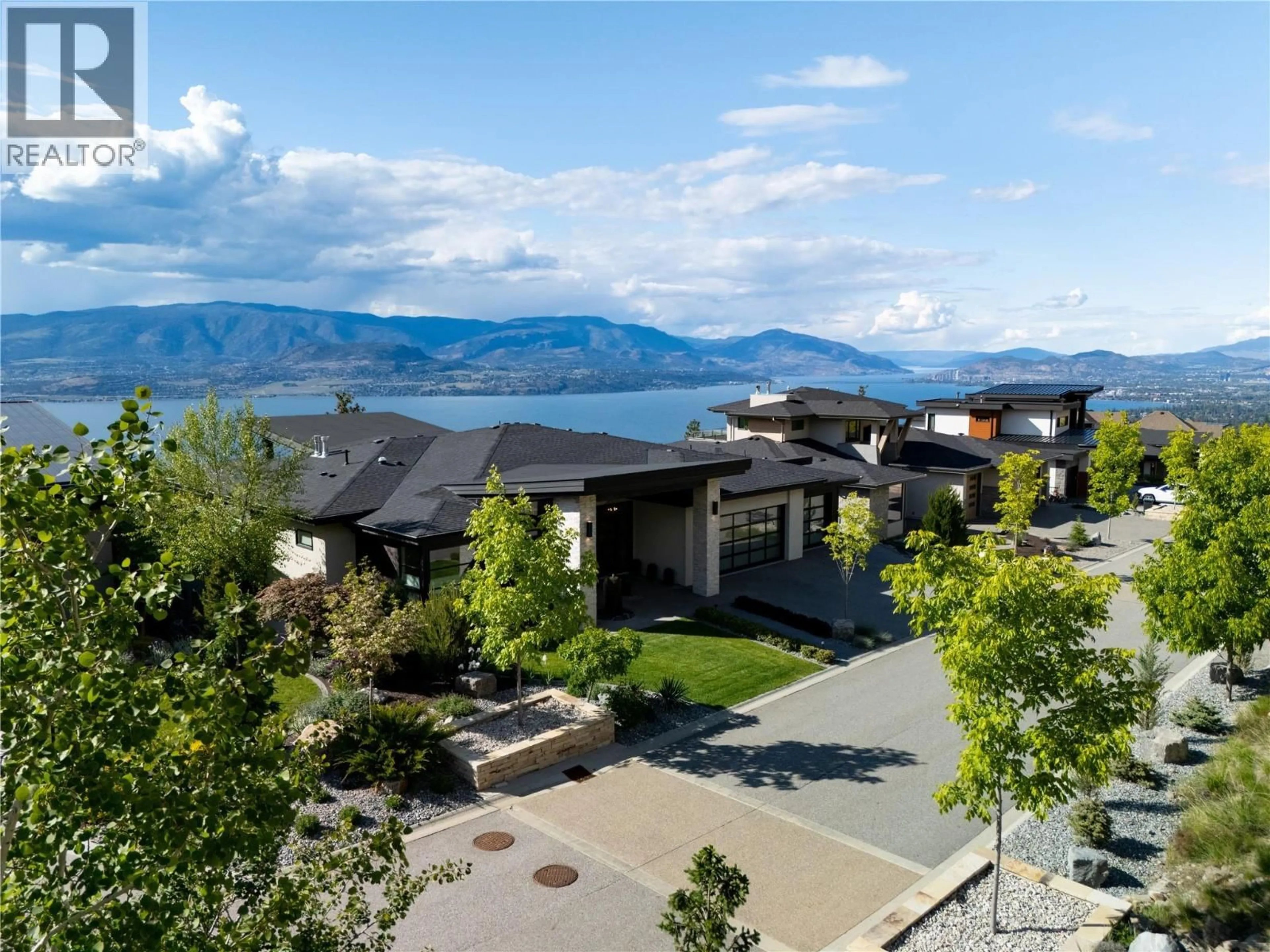 A pic from outside/outdoor area/front of a property/back of a property/a pic from drone, mountain view for 111 - 5650 THE EDGE PLACE, Kelowna British Columbia V1W4L5