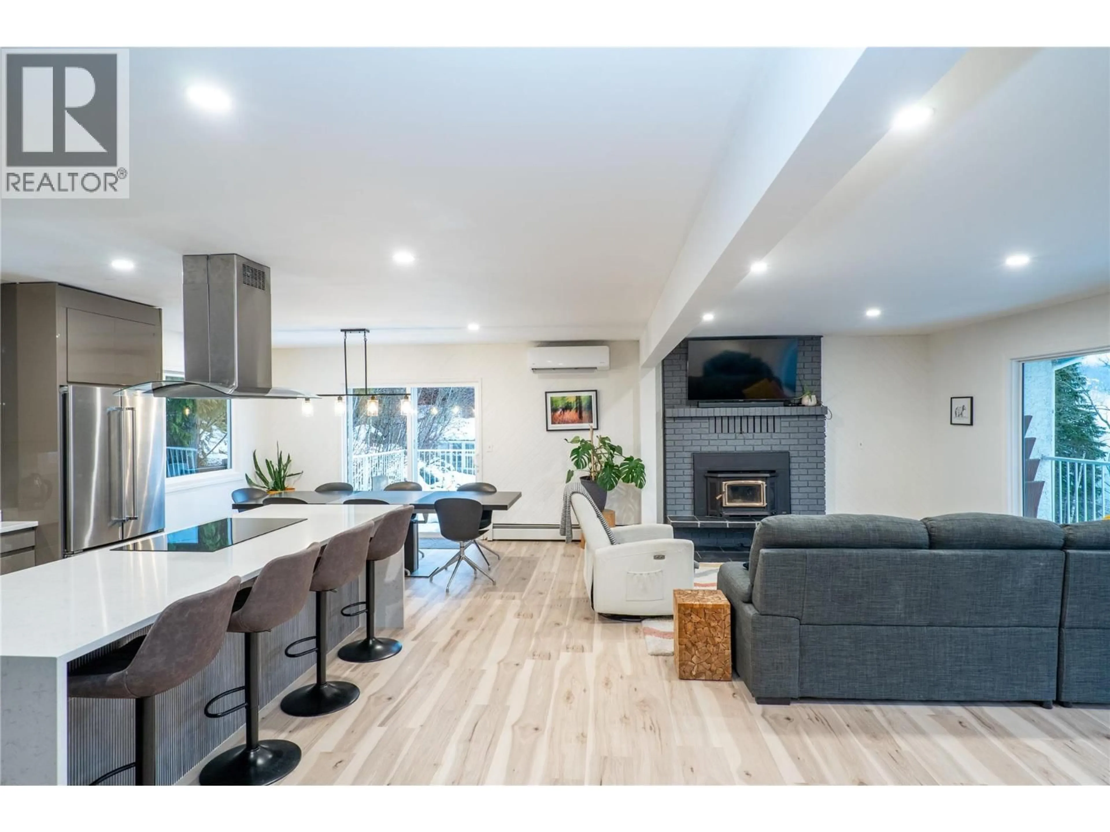 Open concept kitchen, wood/laminate floor for 488 ALPINE LANE, Revelstoke British Columbia V0E2S0