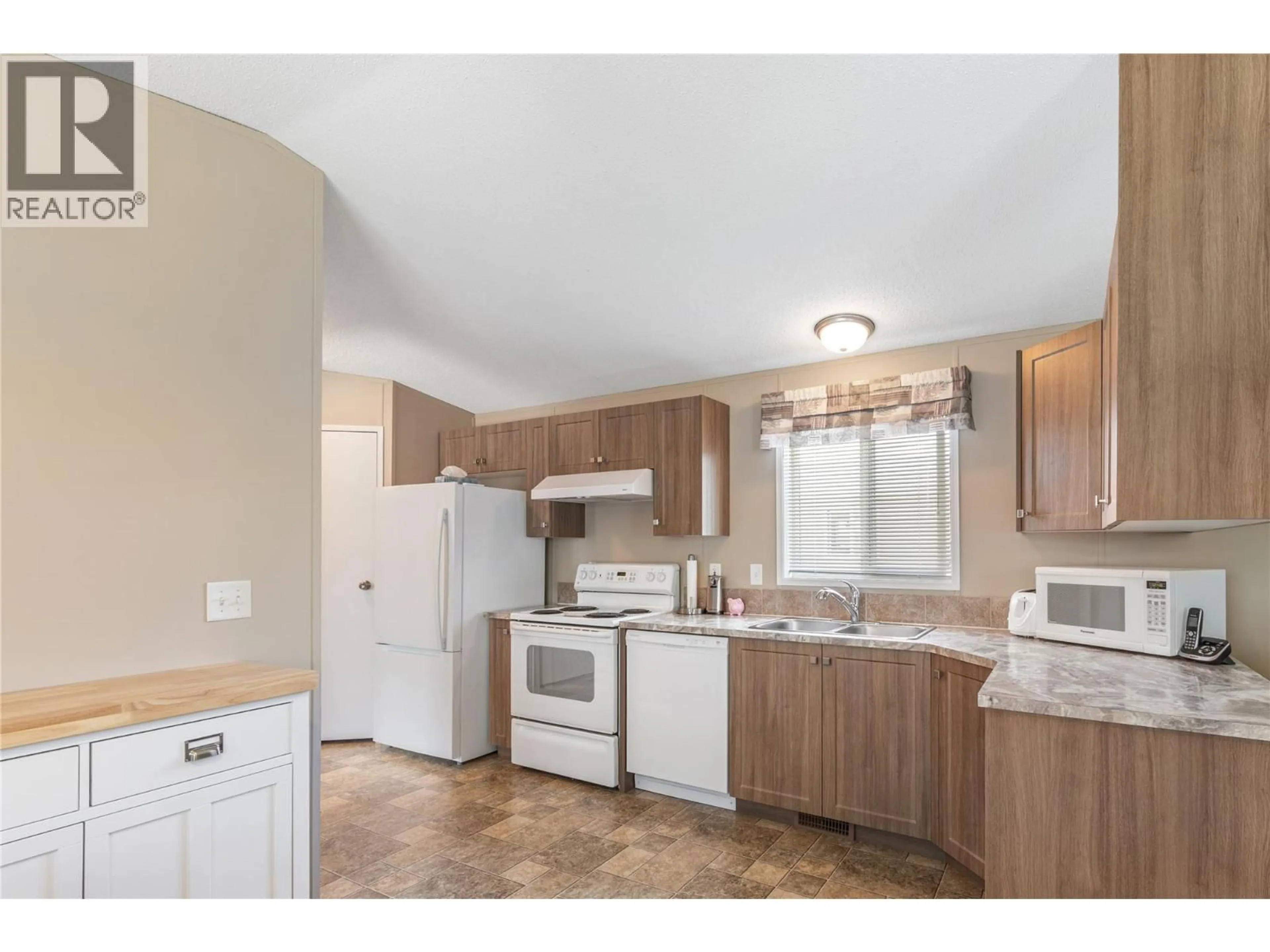 Standard kitchen, unknown for 74 - 12560 WESTSIDE ROAD, Vernon British Columbia V1H1S9