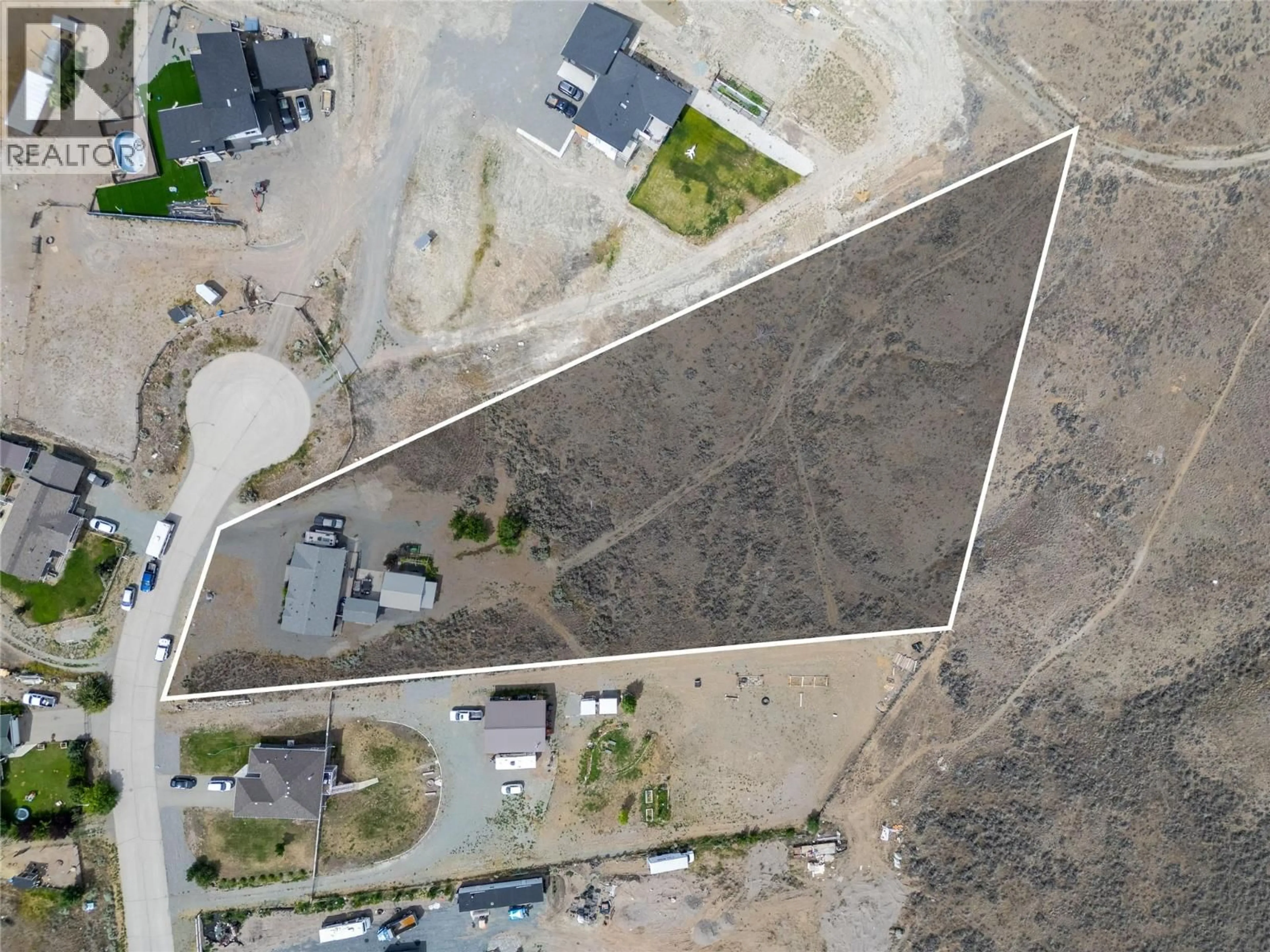 A pic from outside/outdoor area/front of a property/back of a property/a pic from drone, street for 1465 LOPEZ CREEK DRIVE, Cache Creek British Columbia V0K1H0