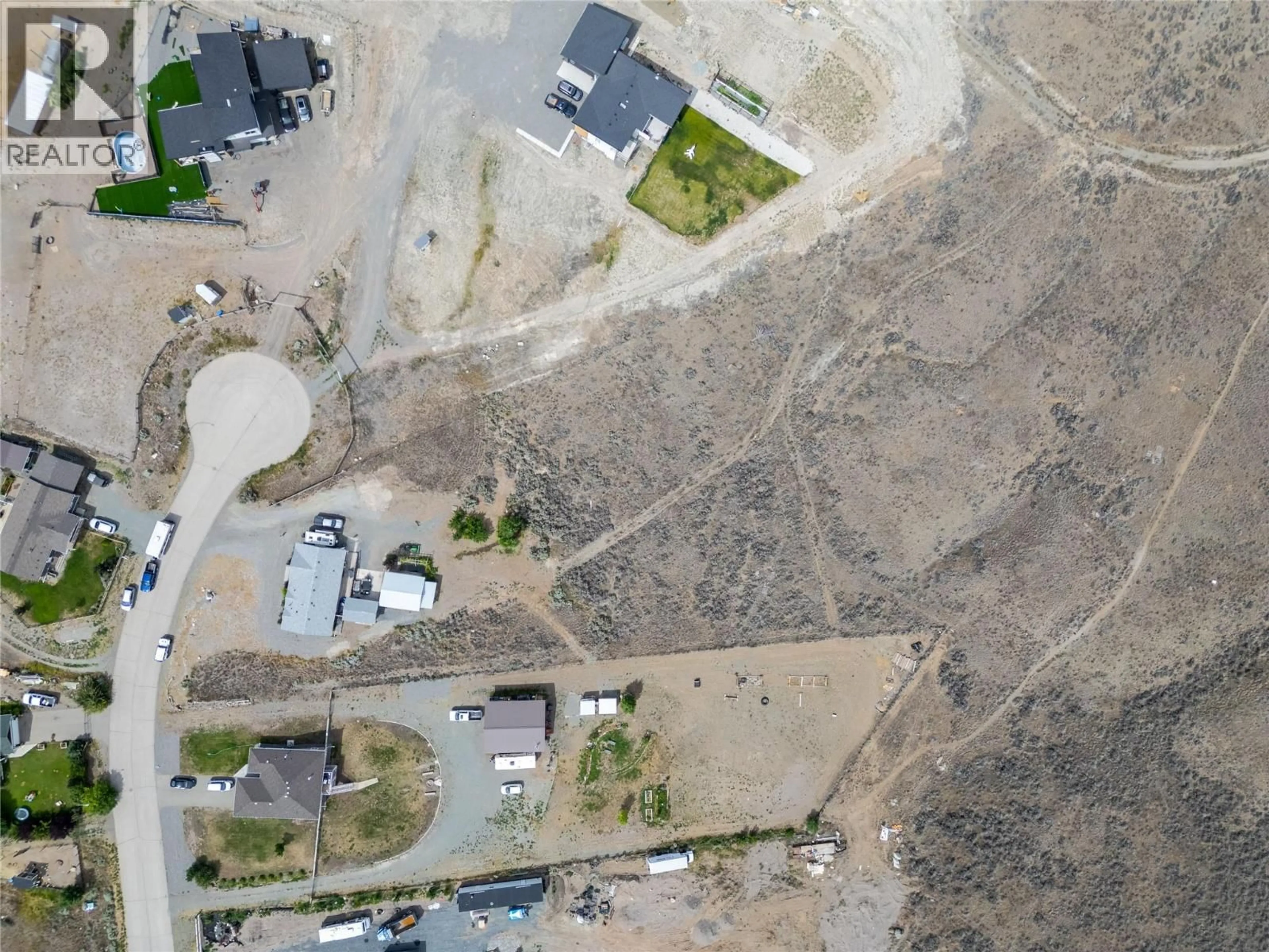A pic from outside/outdoor area/front of a property/back of a property/a pic from drone, street for 1465 LOPEZ CREEK DRIVE, Cache Creek British Columbia V0K1H0