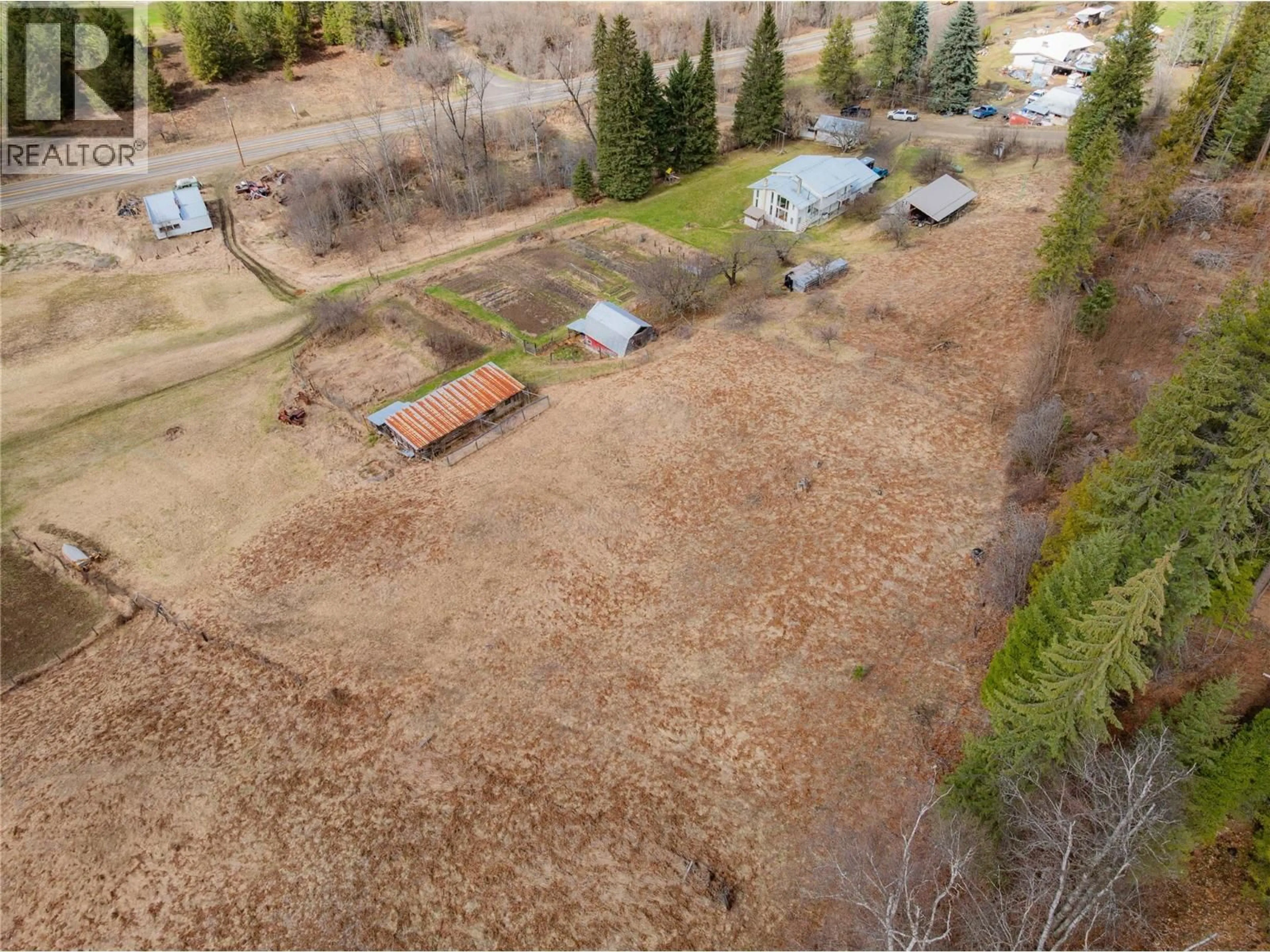 A pic from outside/outdoor area/front of a property/back of a property/a pic from drone, forest/trees view for 6943 KANIGAN ROAD, Appledale British Columbia V0G2J0