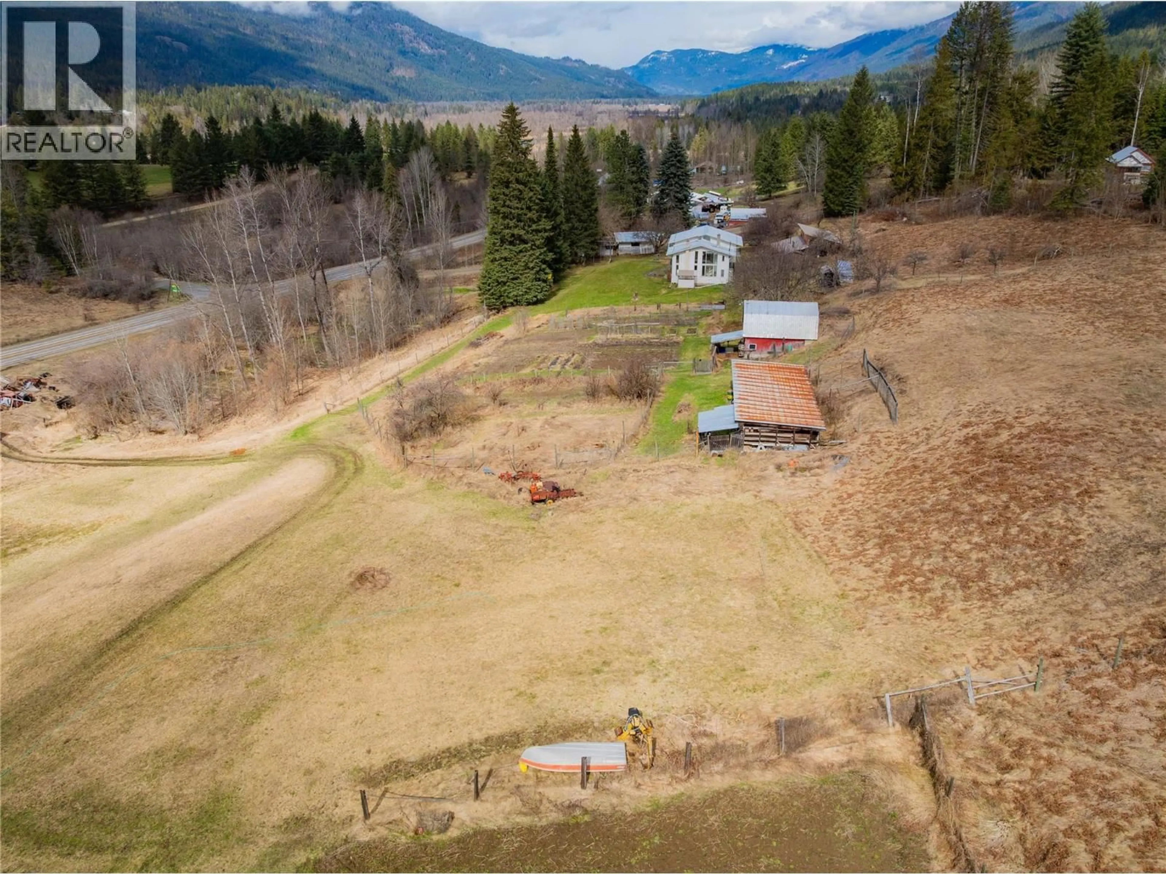 A pic from outside/outdoor area/front of a property/back of a property/a pic from drone, mountain view for 6943 KANIGAN ROAD, Appledale British Columbia V0G2J0