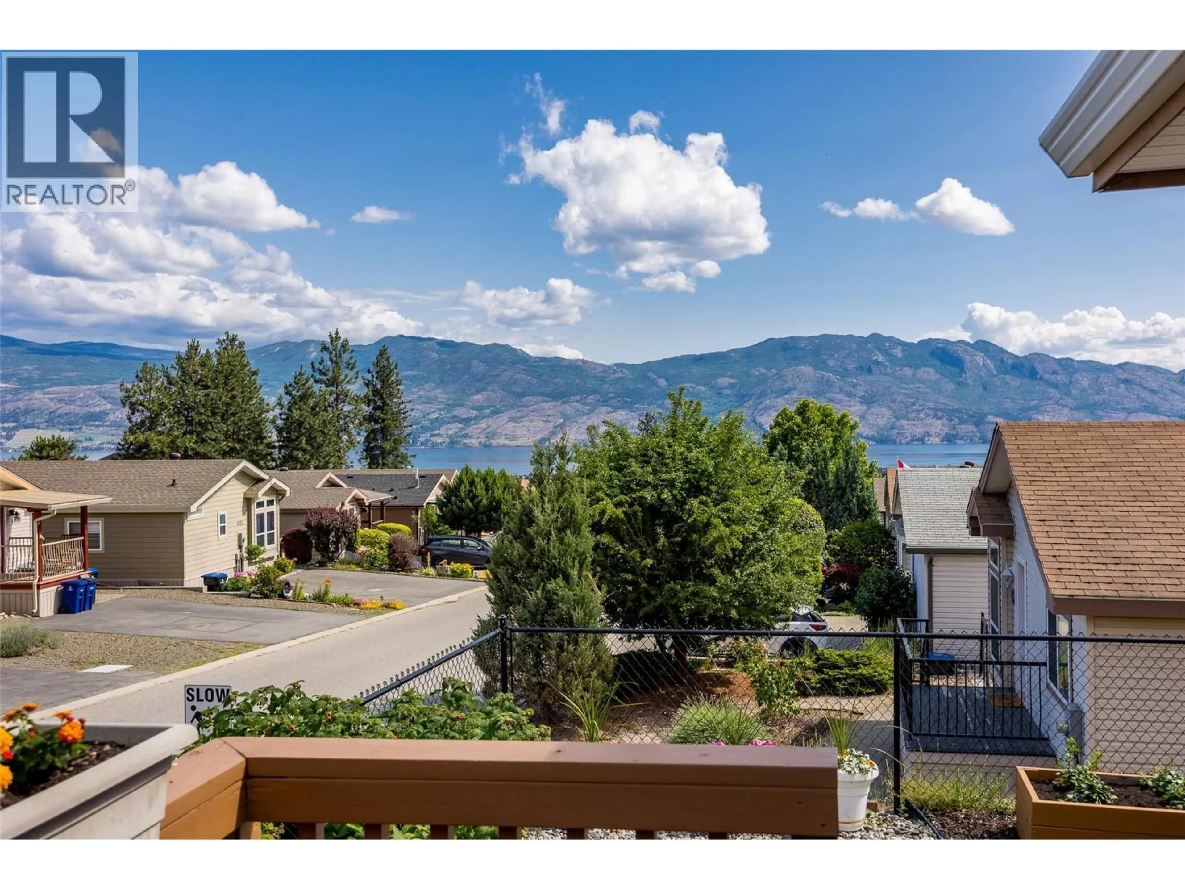 A pic from outside/outdoor area/front of a property/back of a property/a pic from drone, mountain view for 1306 - 2440 OLD OKANAGAN HIGHWAY, West Kelowna British Columbia V4T3A2