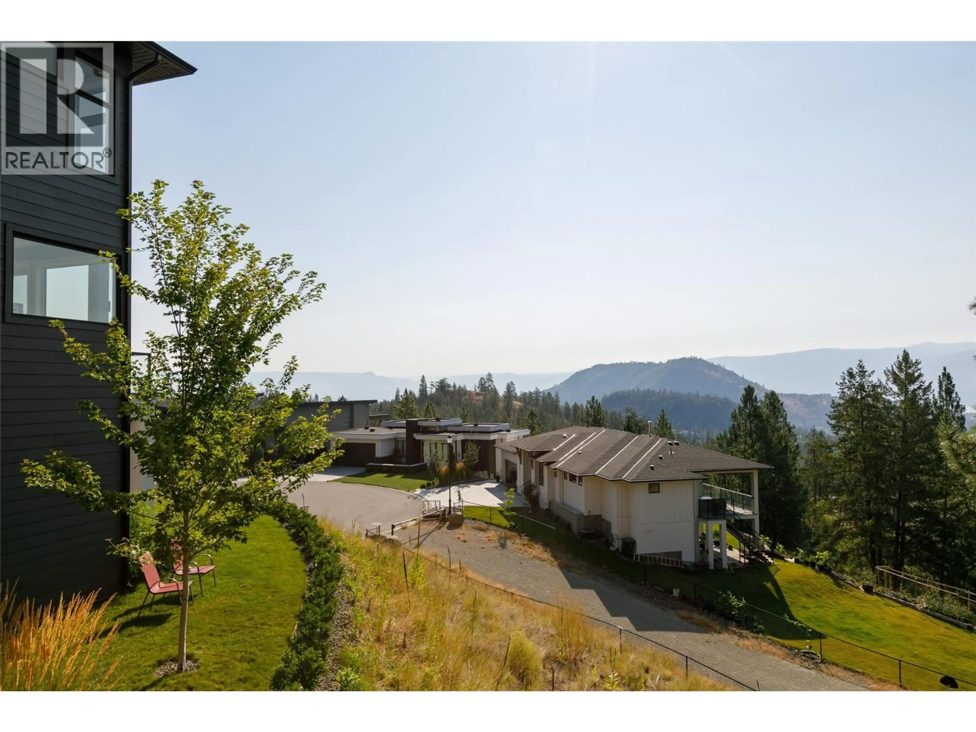 A pic from outside/outdoor area/front of a property/back of a property/a pic from drone, mountain view for 2510 TALLUS HEIGHTS LANE, West Kelowna British Columbia V4T3M2