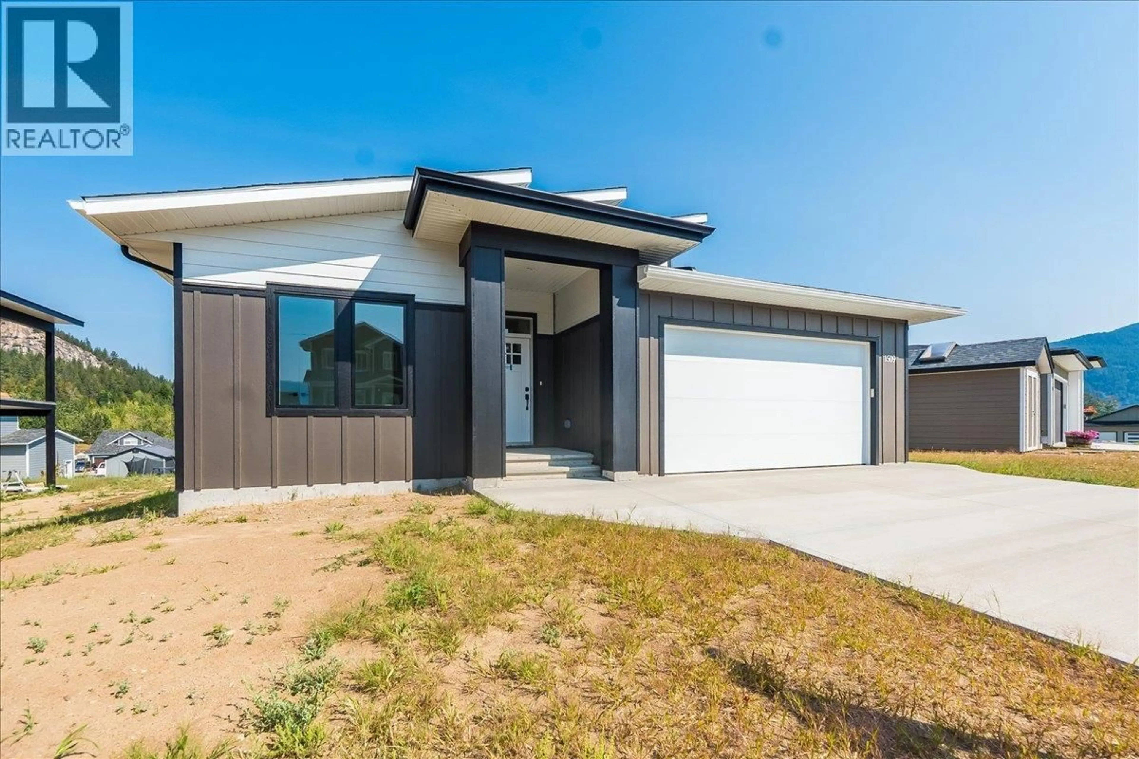 Home with vinyl exterior material, street for 1509 ASPEN LANE, Castlegar British Columbia V1N4X8