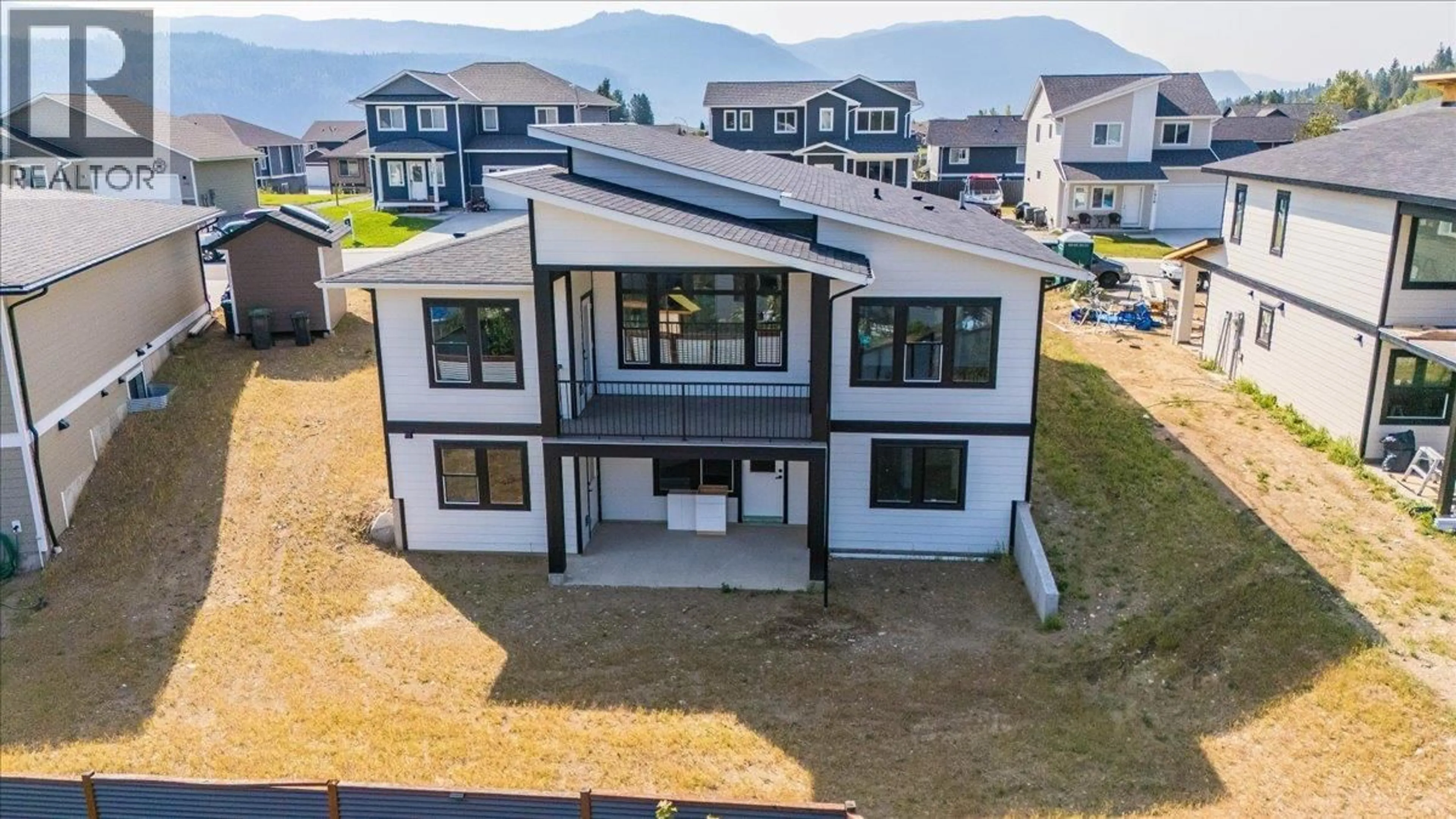 A pic from outside/outdoor area/front of a property/back of a property/a pic from drone, mountain view for 1509 ASPEN LANE, Castlegar British Columbia V1N4X8