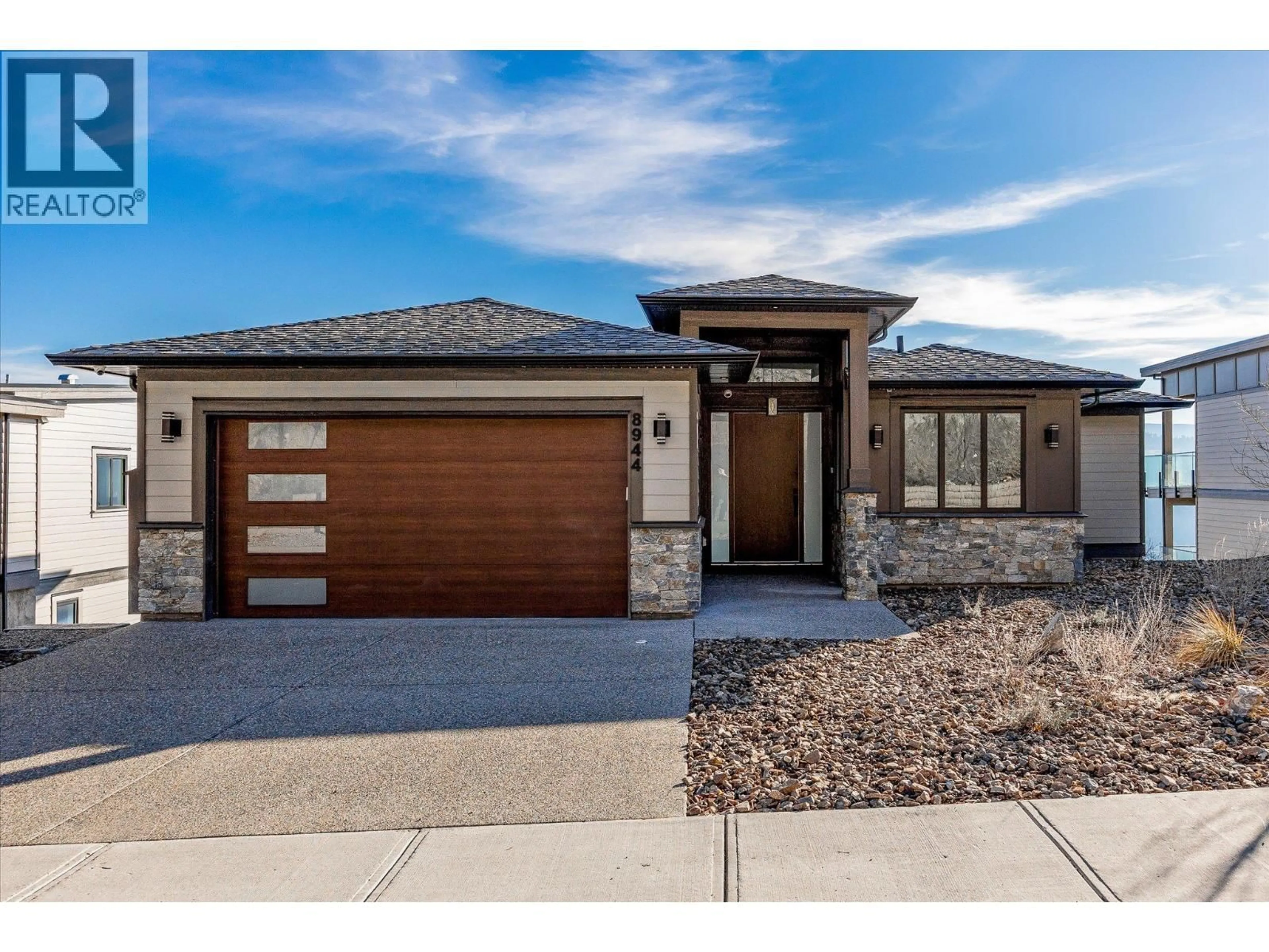 Home with brick exterior material, street for 8944 TAVISTOCK ROAD, Vernon British Columbia V1H2K9