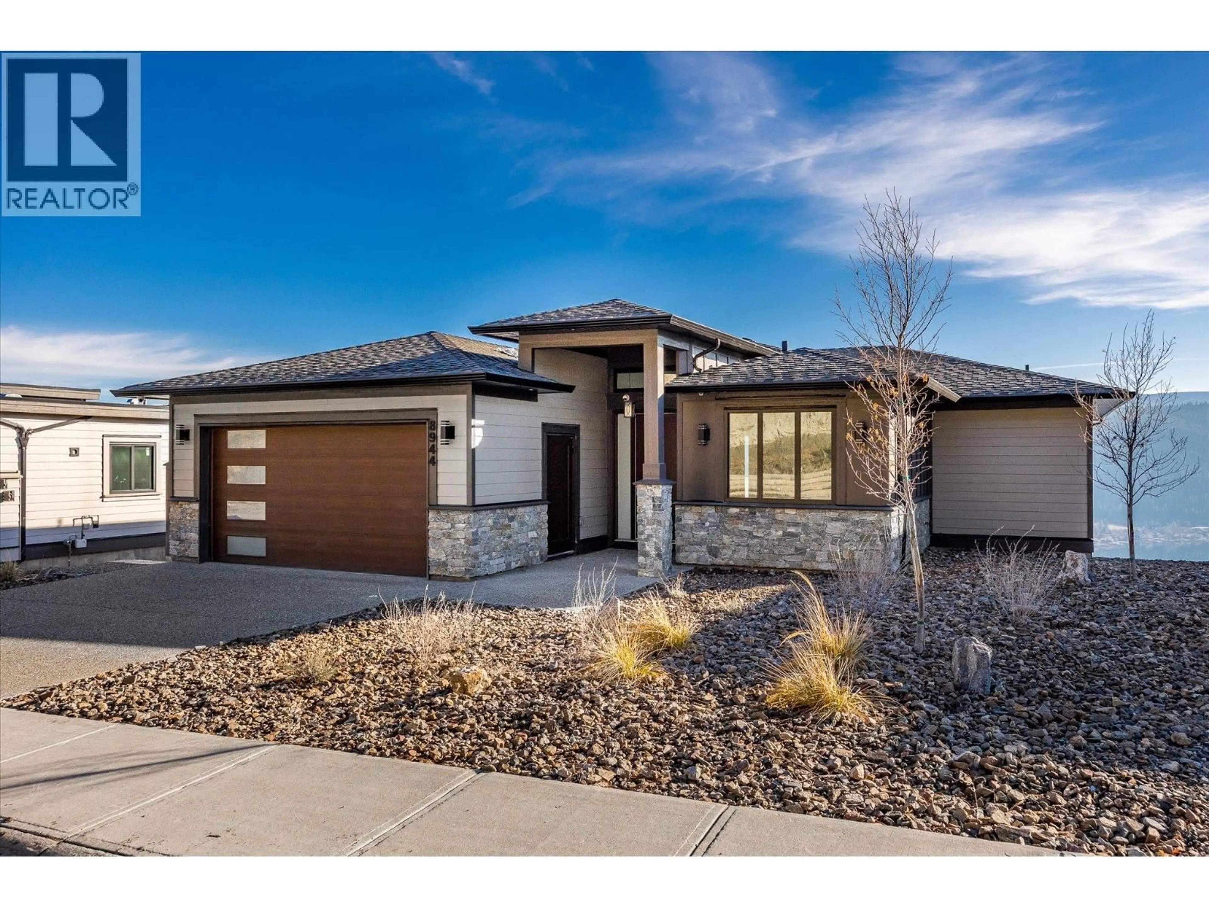 Home with brick exterior material, street for 8944 TAVISTOCK ROAD, Vernon British Columbia V1H2K9