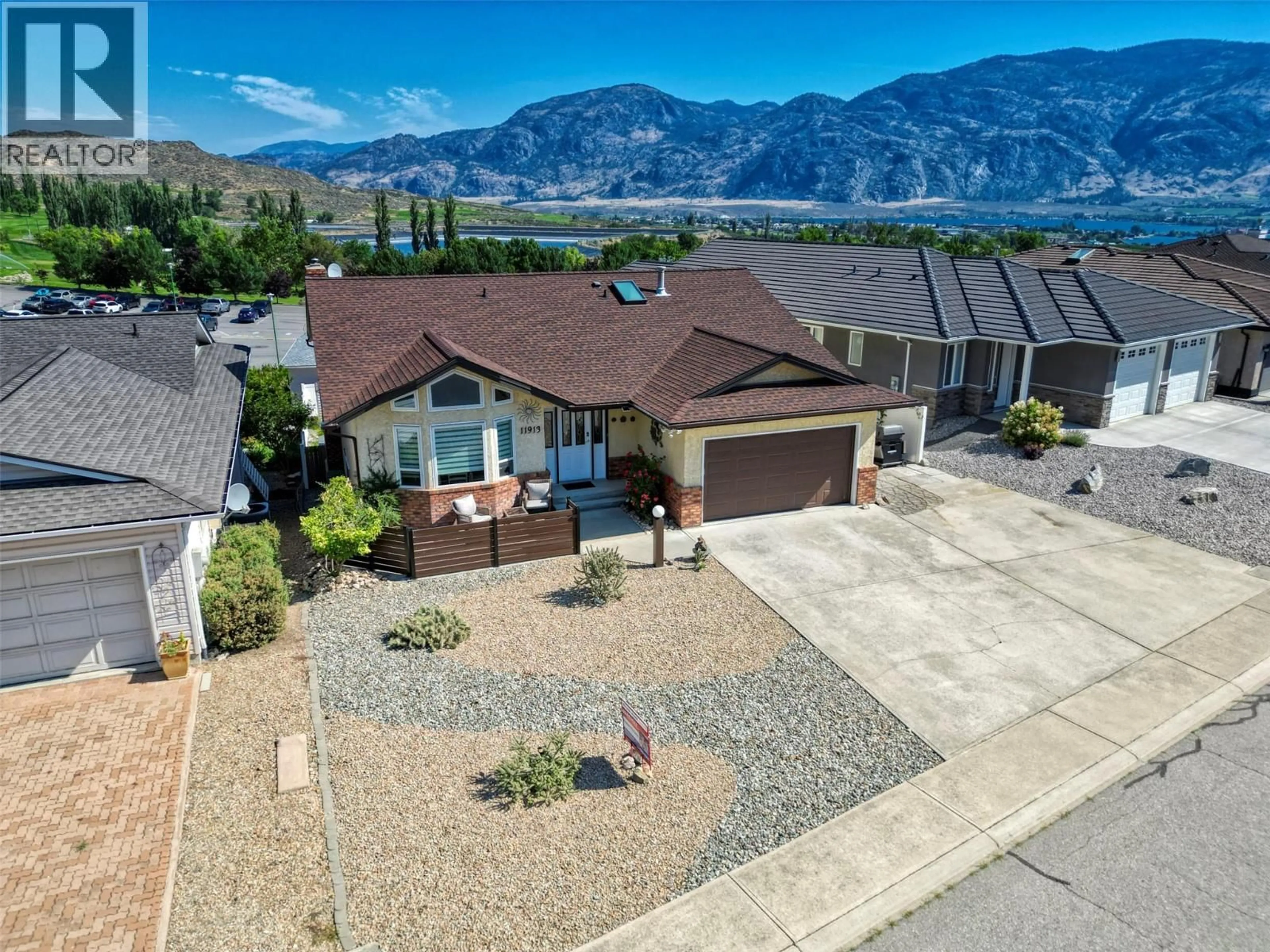 A pic from outside/outdoor area/front of a property/back of a property/a pic from drone, mountain view for 11913 QUAIL RIDGE PLACE, Osoyoos British Columbia V0H1V4
