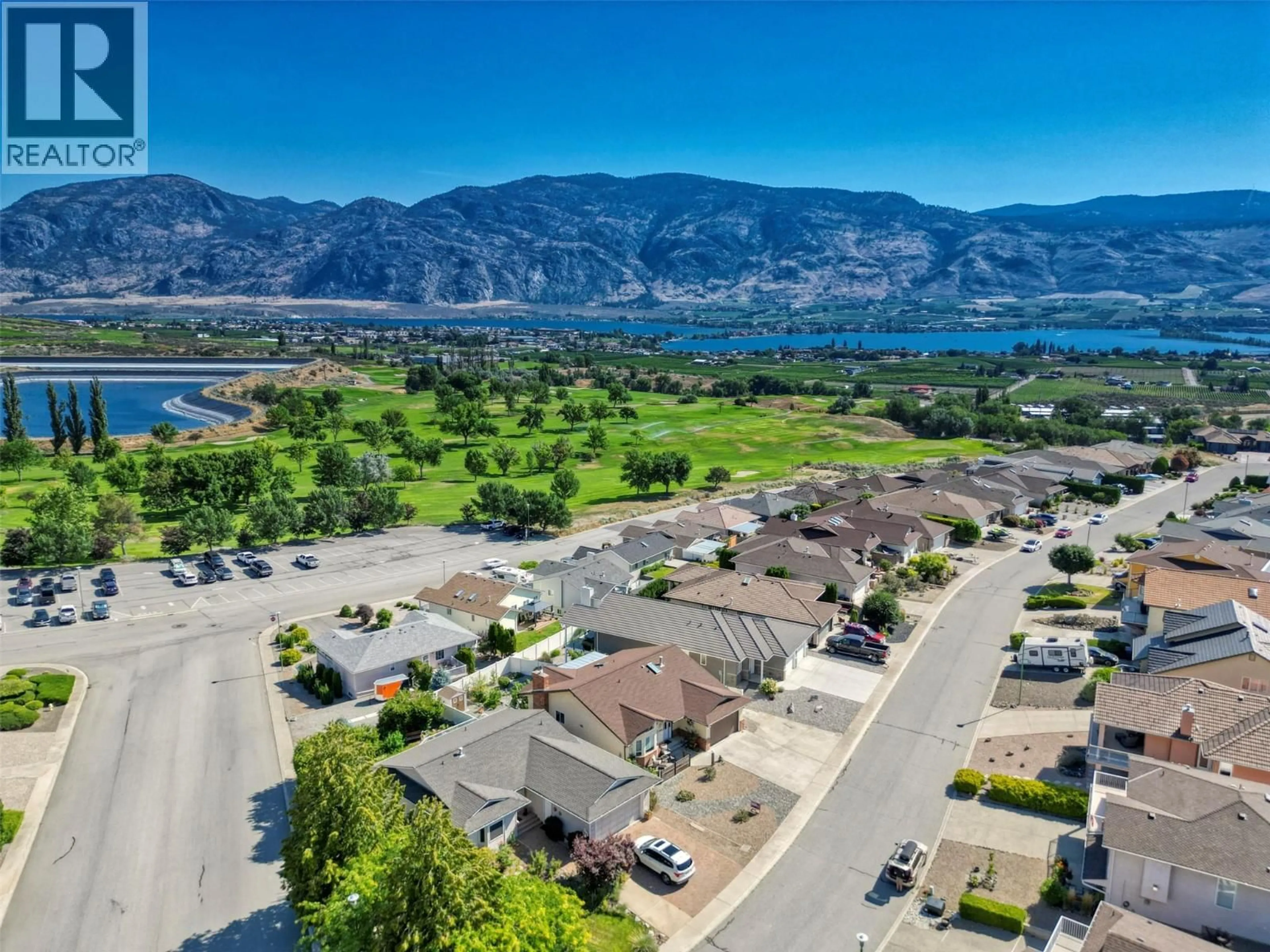 A pic from outside/outdoor area/front of a property/back of a property/a pic from drone, mountain view for 11913 QUAIL RIDGE PLACE, Osoyoos British Columbia V0H1V4