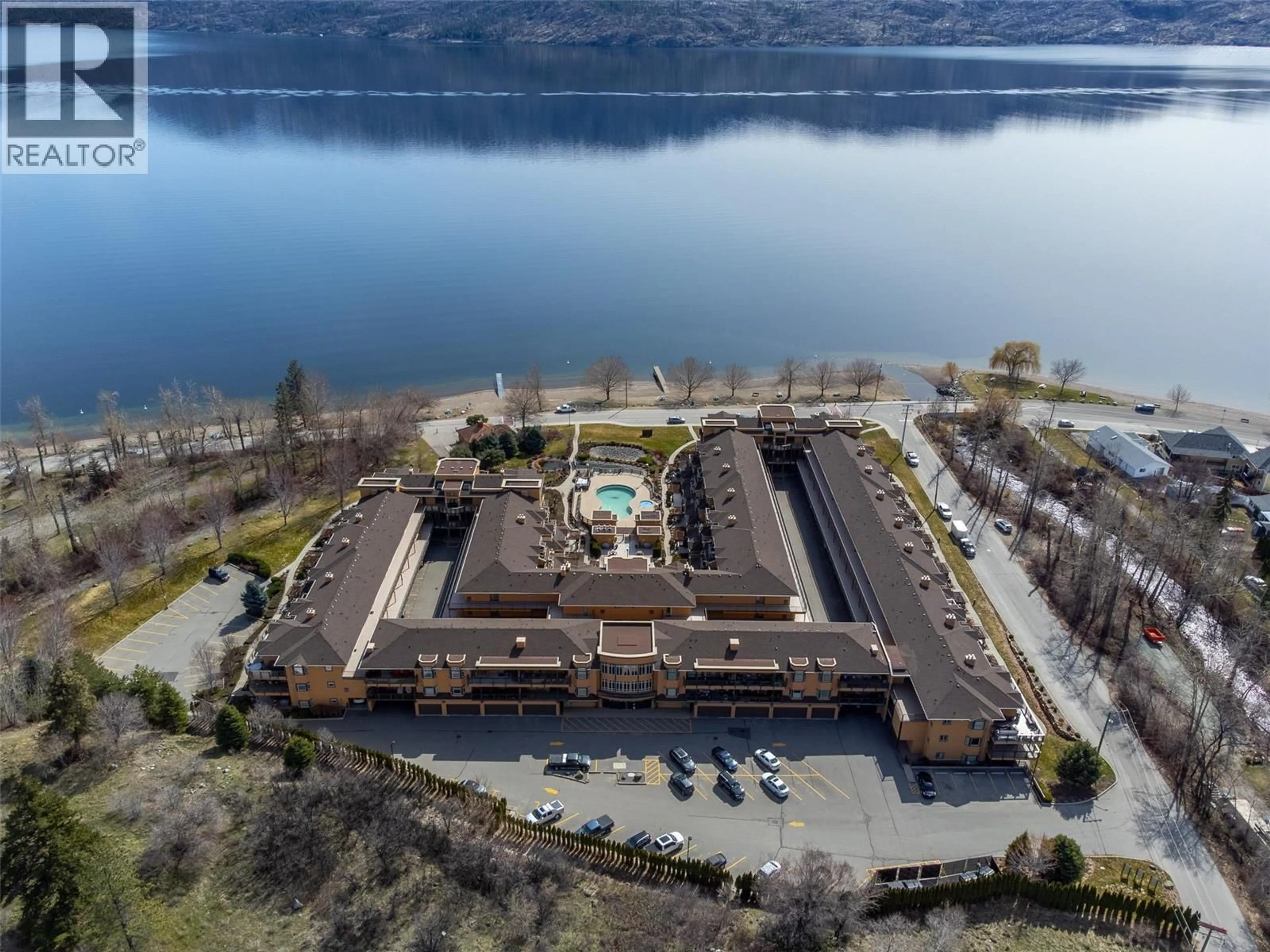 A pic from outside/outdoor area/front of a property/back of a property/a pic from drone, water/lake/river/ocean view for 201 - 3996 BEACH AVENUE, Peachland British Columbia V0H1X5