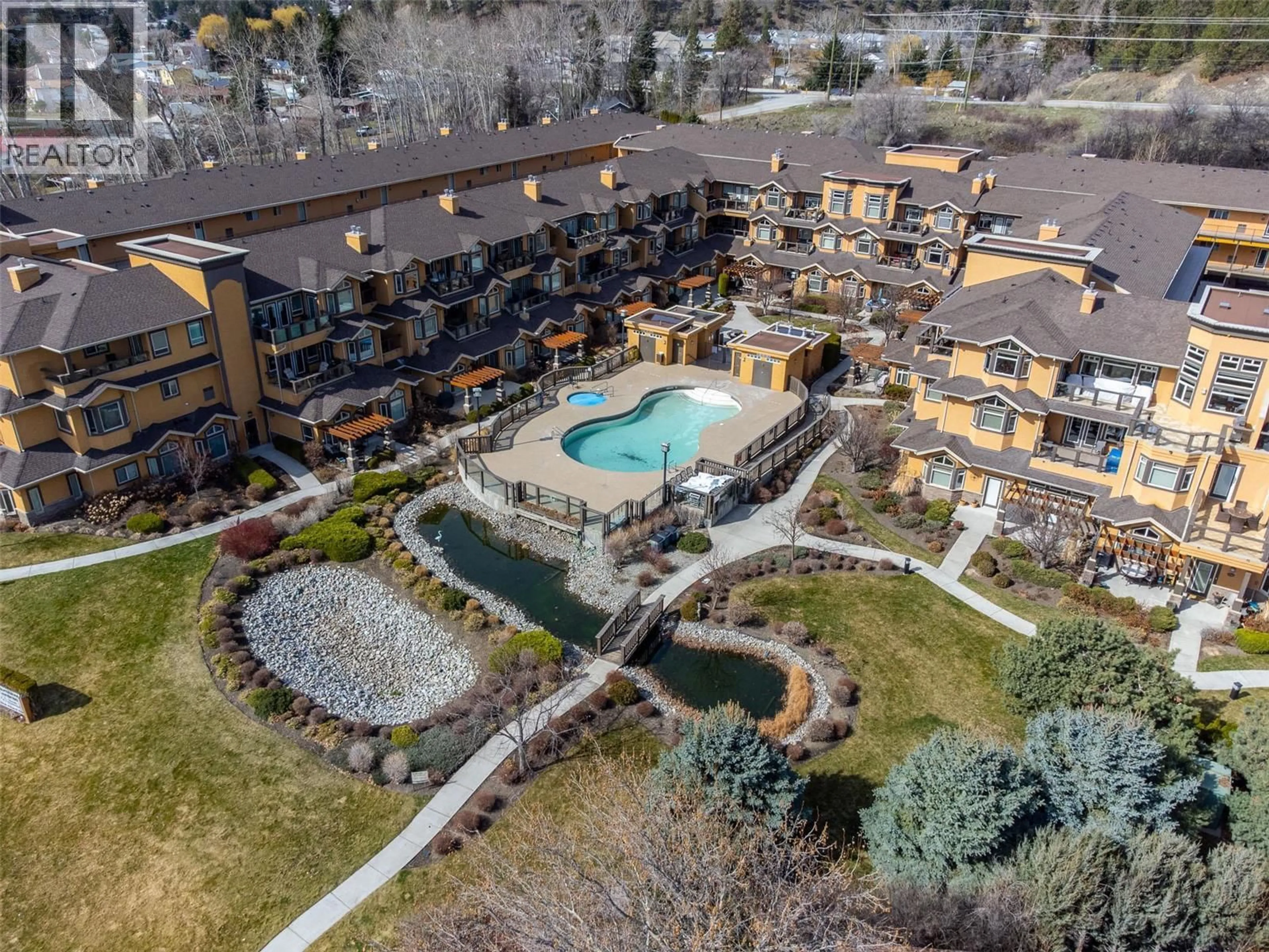 A pic from outside/outdoor area/front of a property/back of a property/a pic from drone, mountain view for 201 - 3996 BEACH AVENUE, Peachland British Columbia V0H1X5