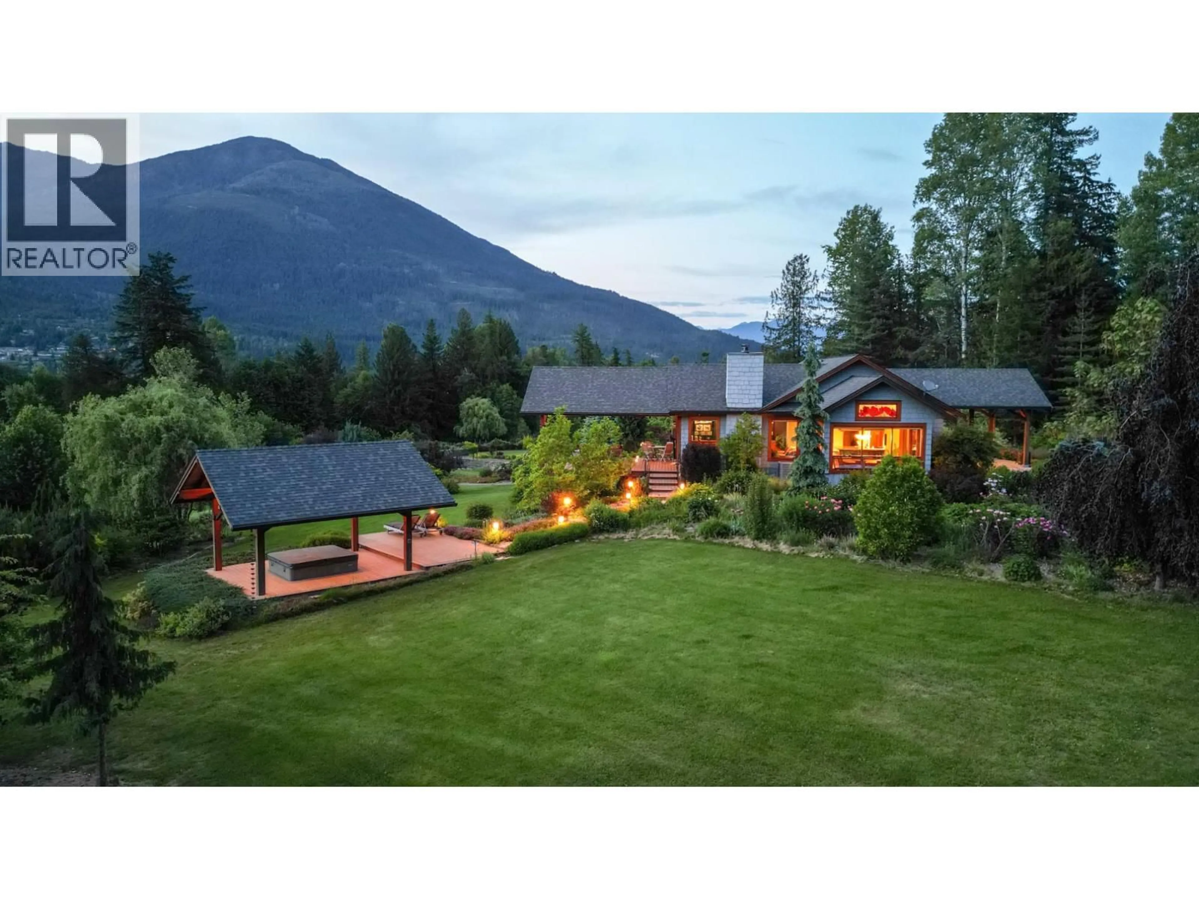 A pic from outside/outdoor area/front of a property/back of a property/a pic from drone, mountain view for 6890 HARROP-PROCTER ROAD, Harrop British Columbia V1L6R2