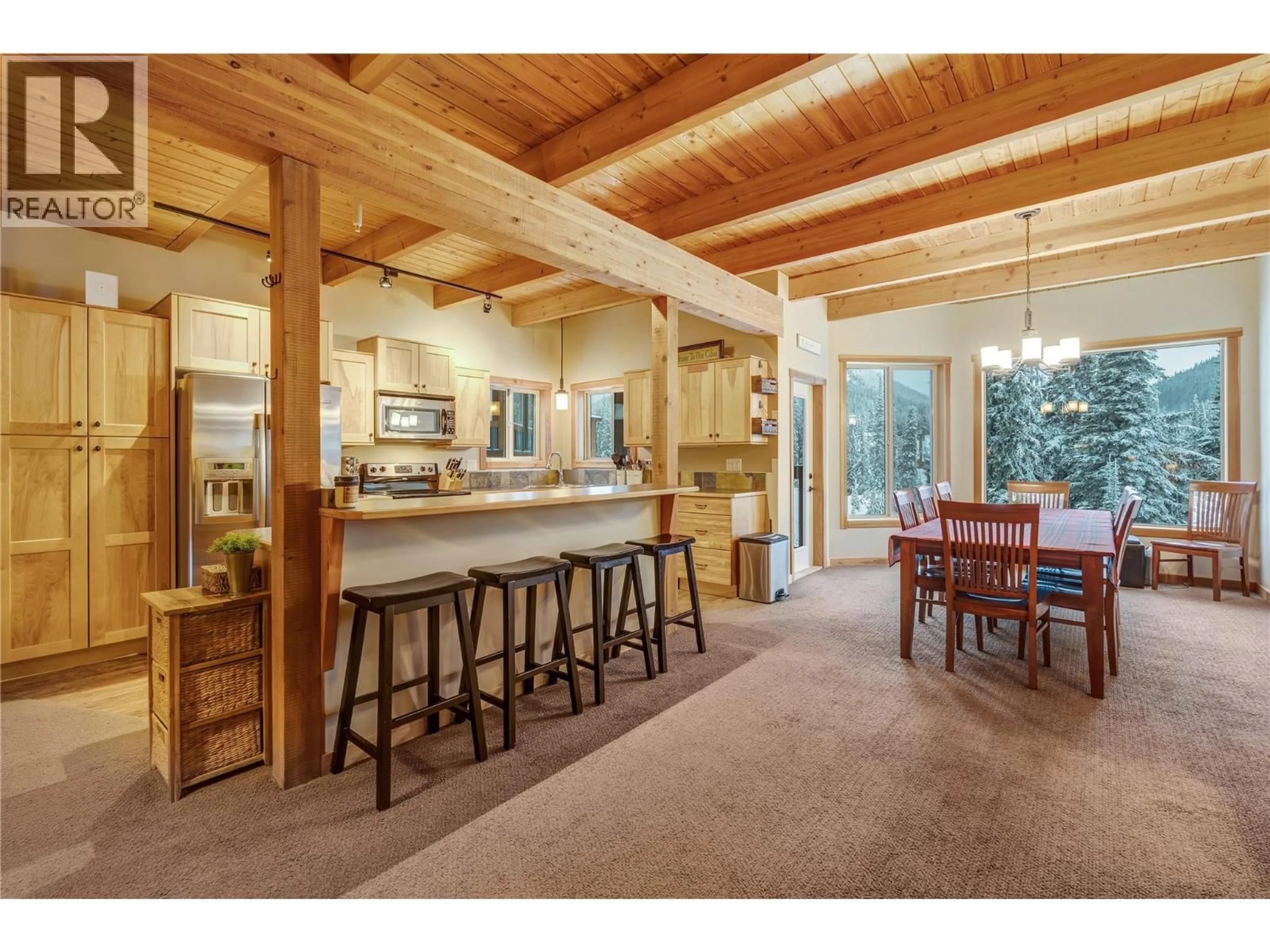 Open concept kitchen, wood/laminate floor for 17 - 308 CREEKVIEW ROAD, Penticton British Columbia V2A0E2