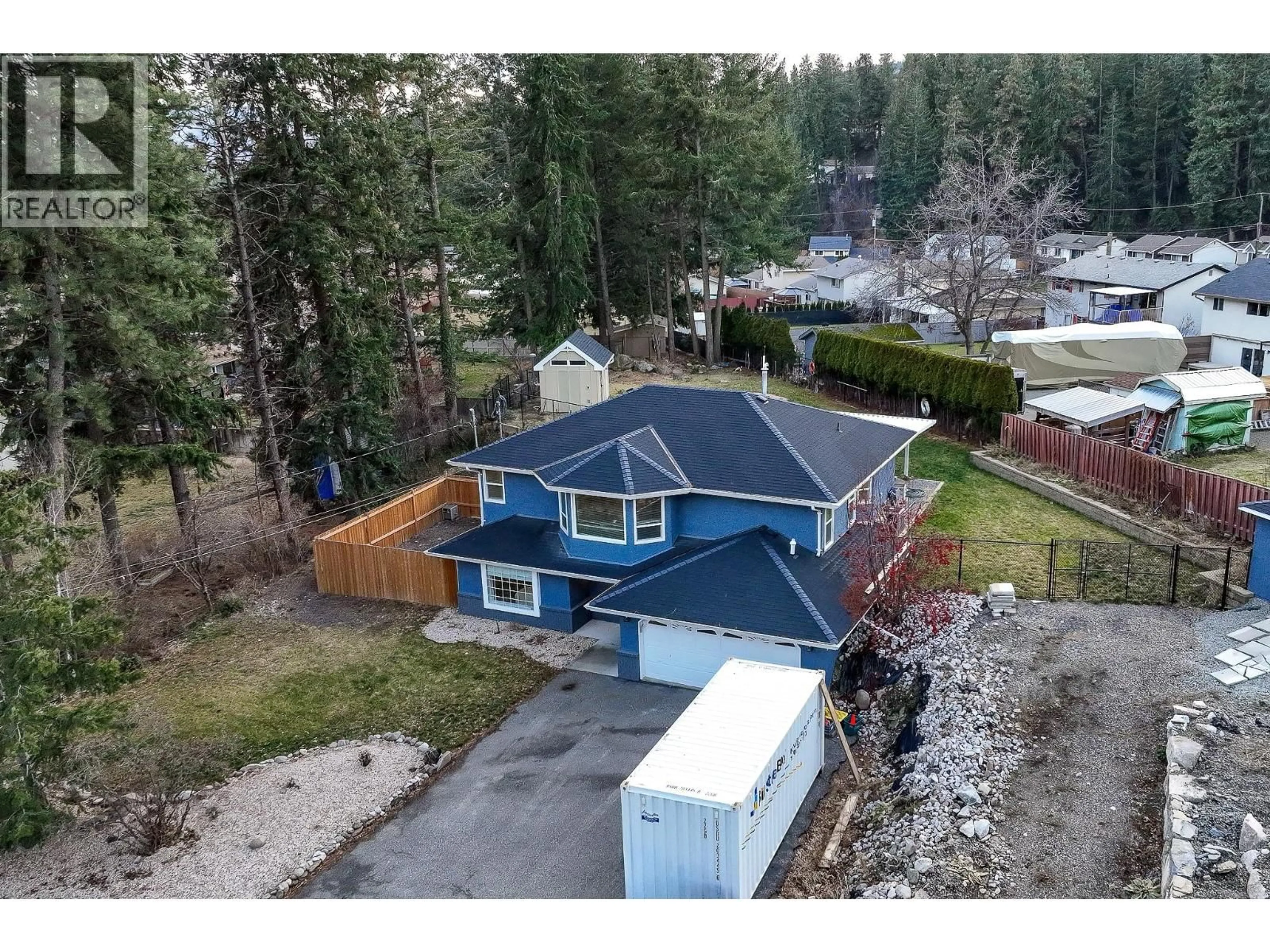 A pic from outside/outdoor area/front of a property/back of a property/a pic from drone, unknown for 3118 MCIVER ROAD, West Kelowna British Columbia V4T1E6