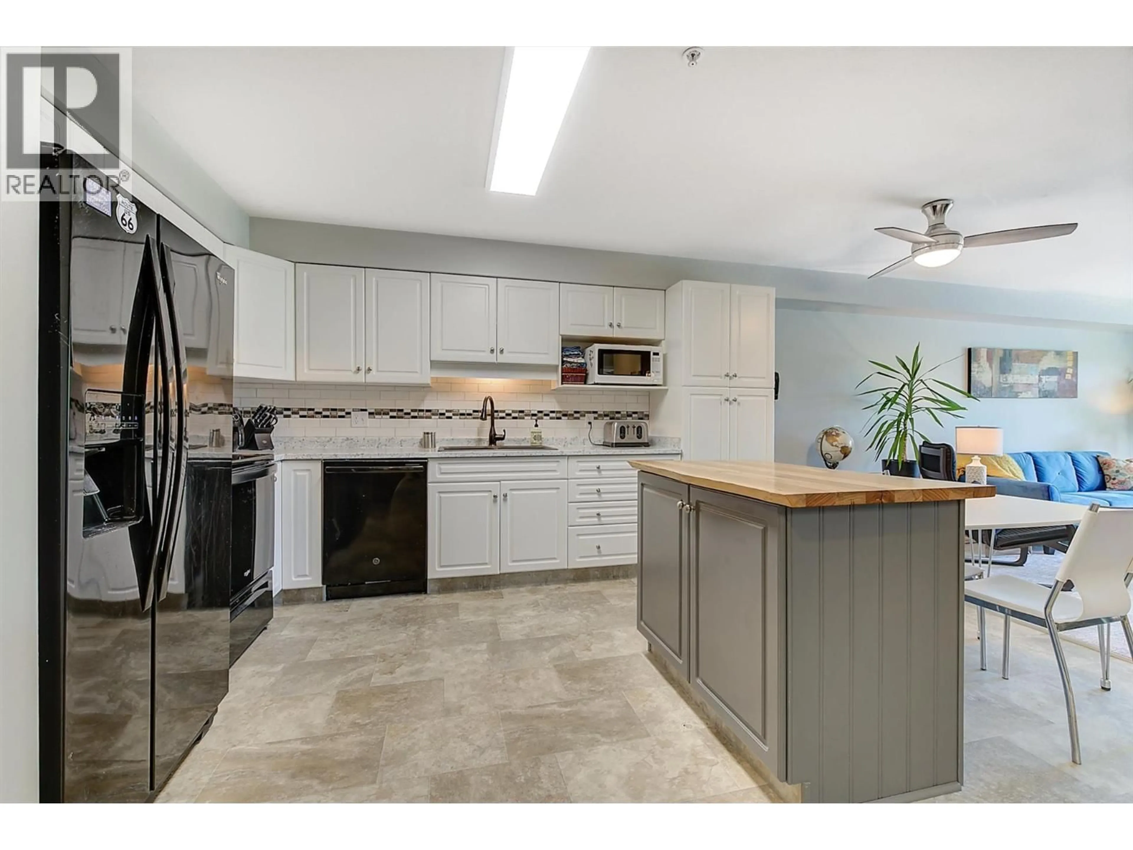 Open concept kitchen, ceramic/tile floor for 204 - 265 FROELICH ROAD, Kelowna British Columbia V1X3M6