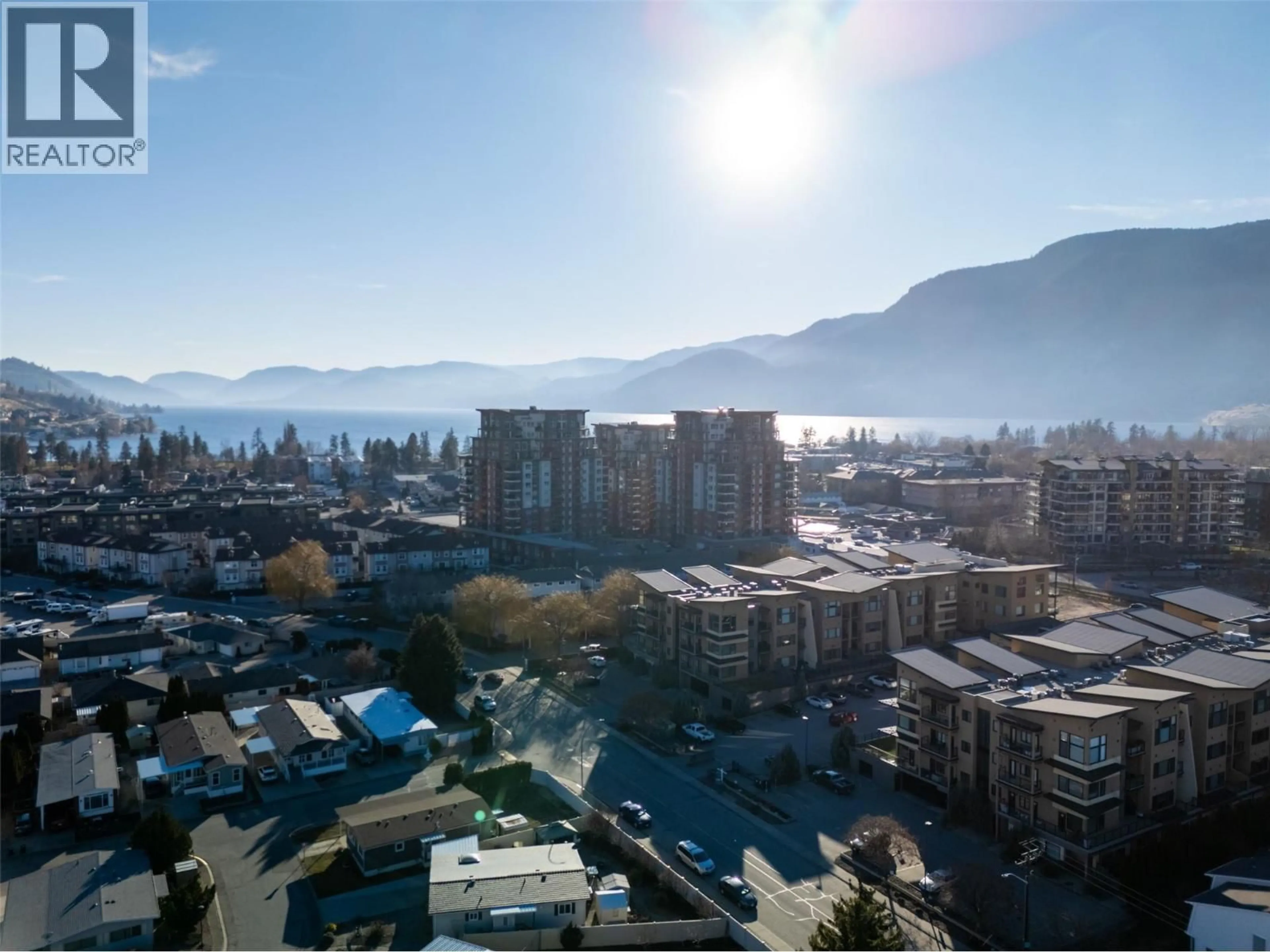 A pic from outside/outdoor area/front of a property/back of a property/a pic from drone, mountain view for 404 - 3313 WILSON STREET, Penticton British Columbia V2A8J3