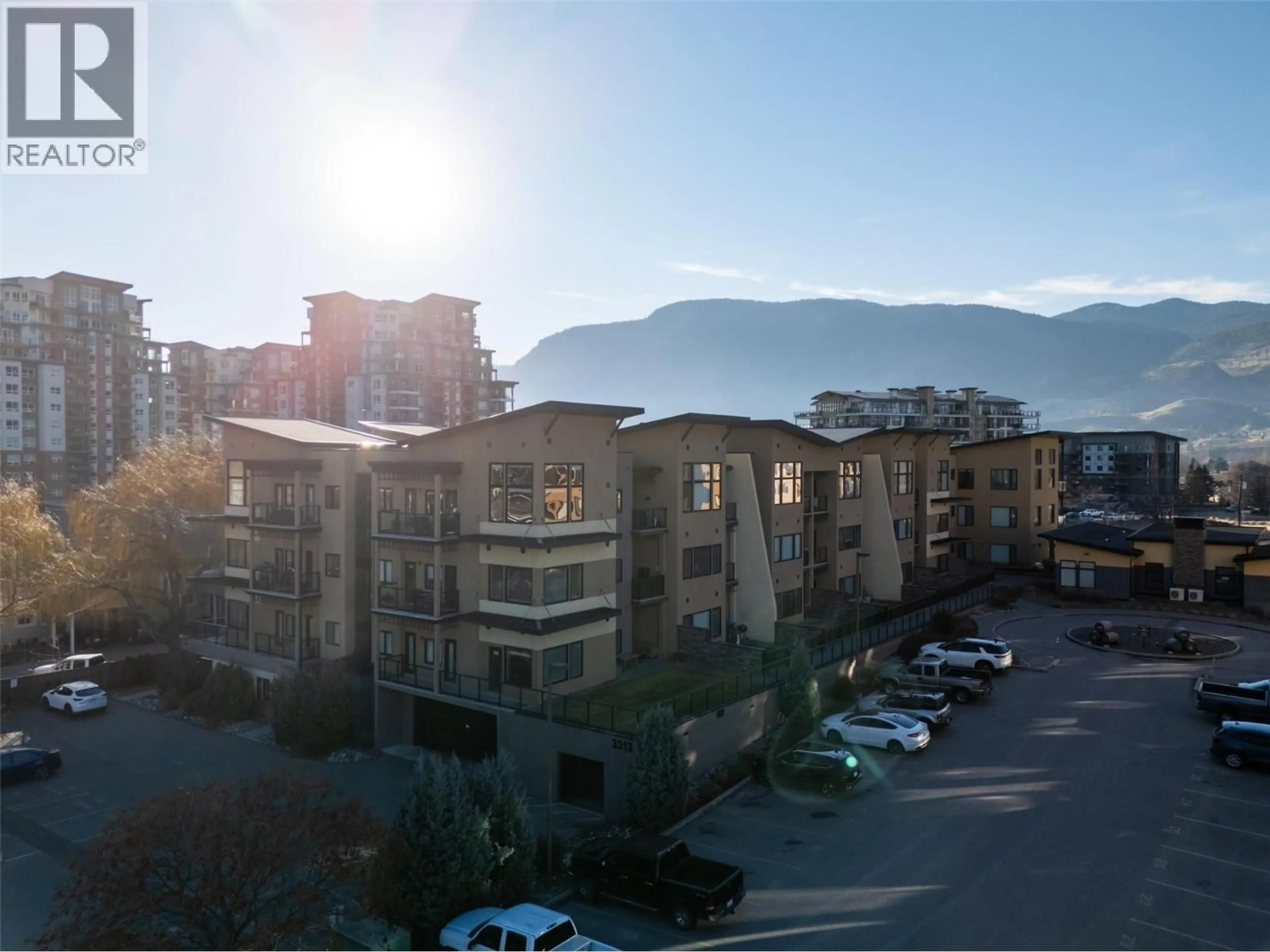 A pic from outside/outdoor area/front of a property/back of a property/a pic from drone, mountain view for 404 - 3313 WILSON STREET, Penticton British Columbia V2A8J3