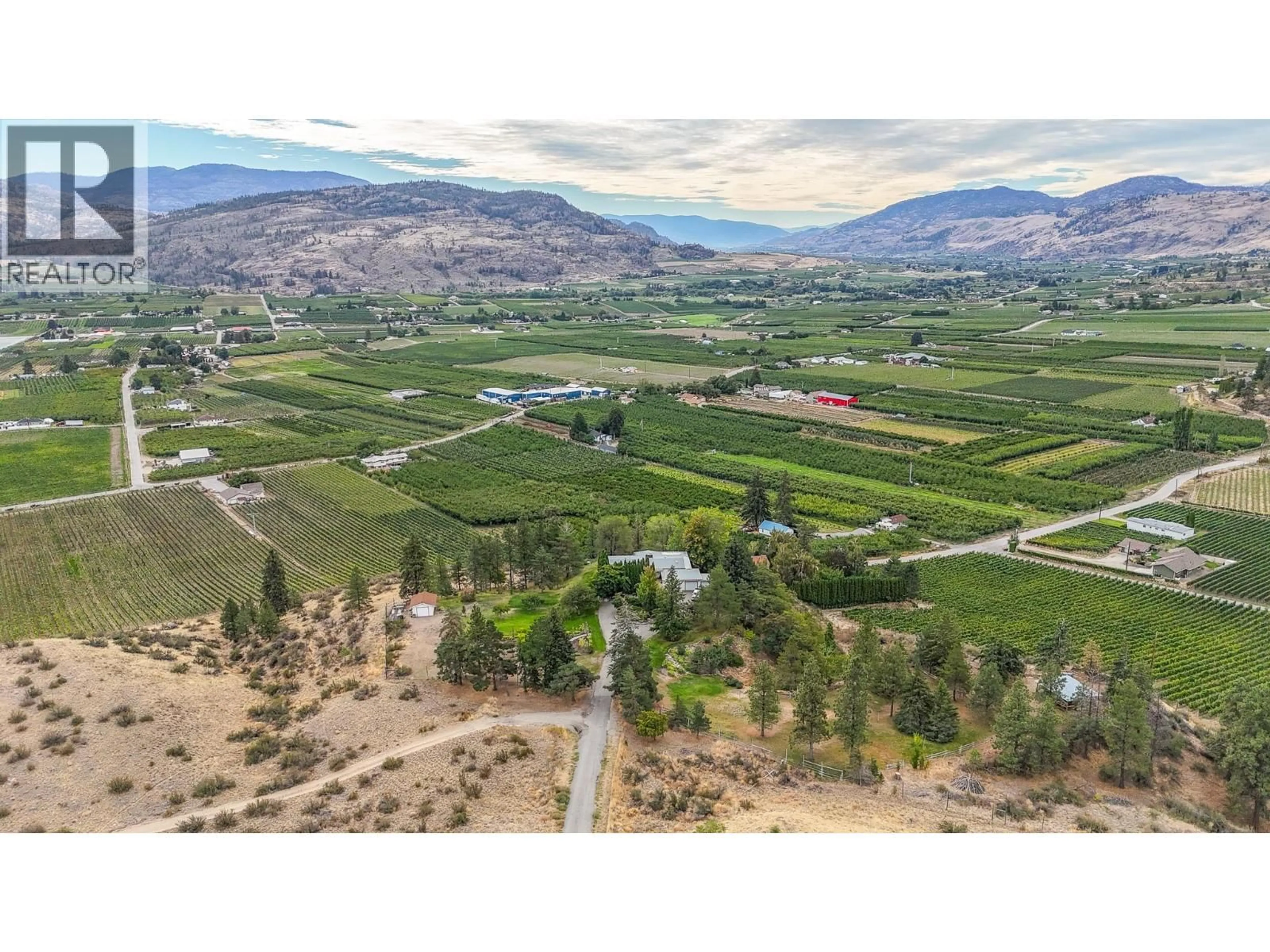 A pic from outside/outdoor area/front of a property/back of a property/a pic from drone, mountain view for 101 KNIPPELBERG ROAD, Oliver British Columbia V0H1T5
