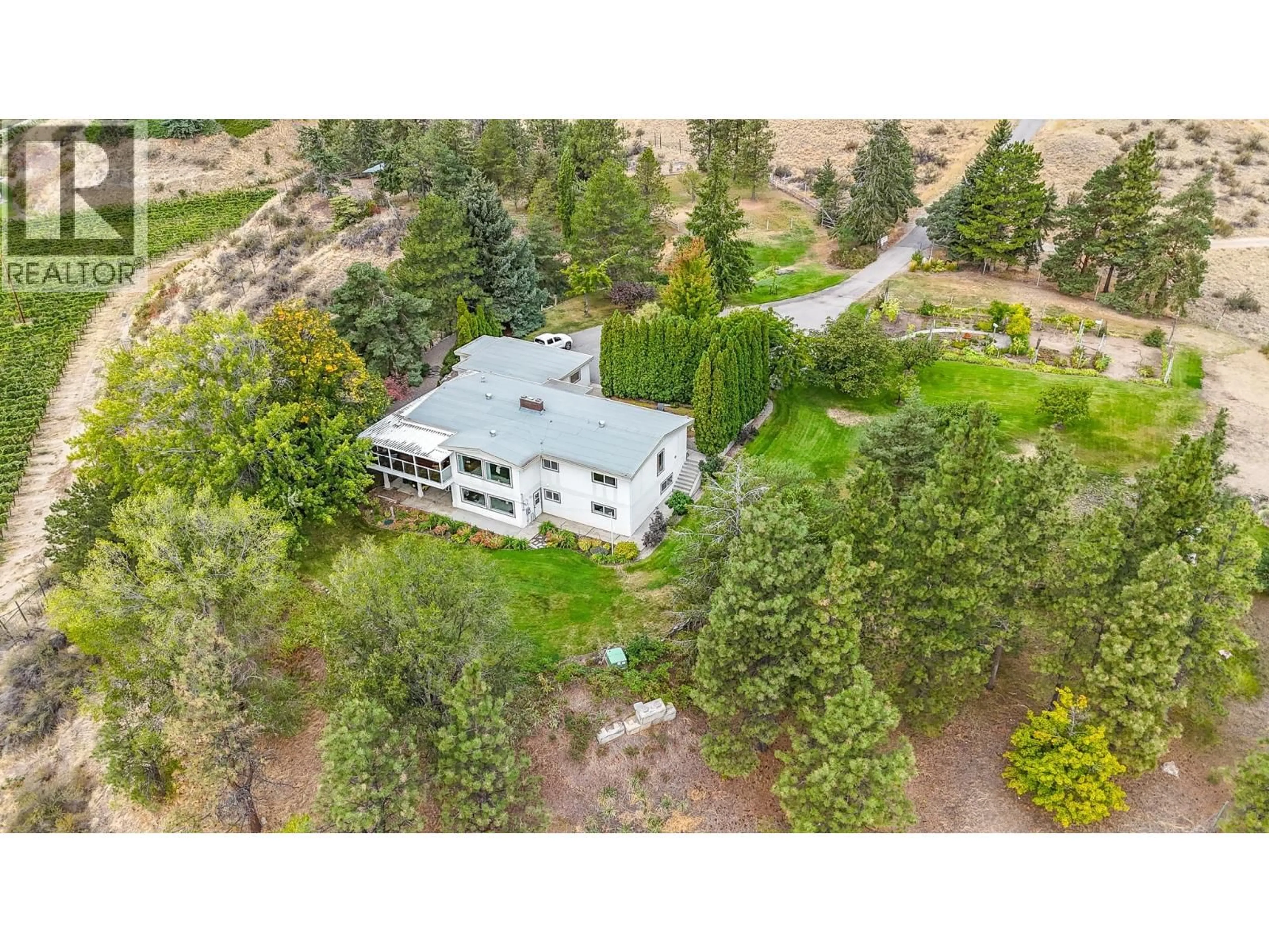 A pic from outside/outdoor area/front of a property/back of a property/a pic from drone, unknown for 101 KNIPPELBERG ROAD, Oliver British Columbia V0H1T5