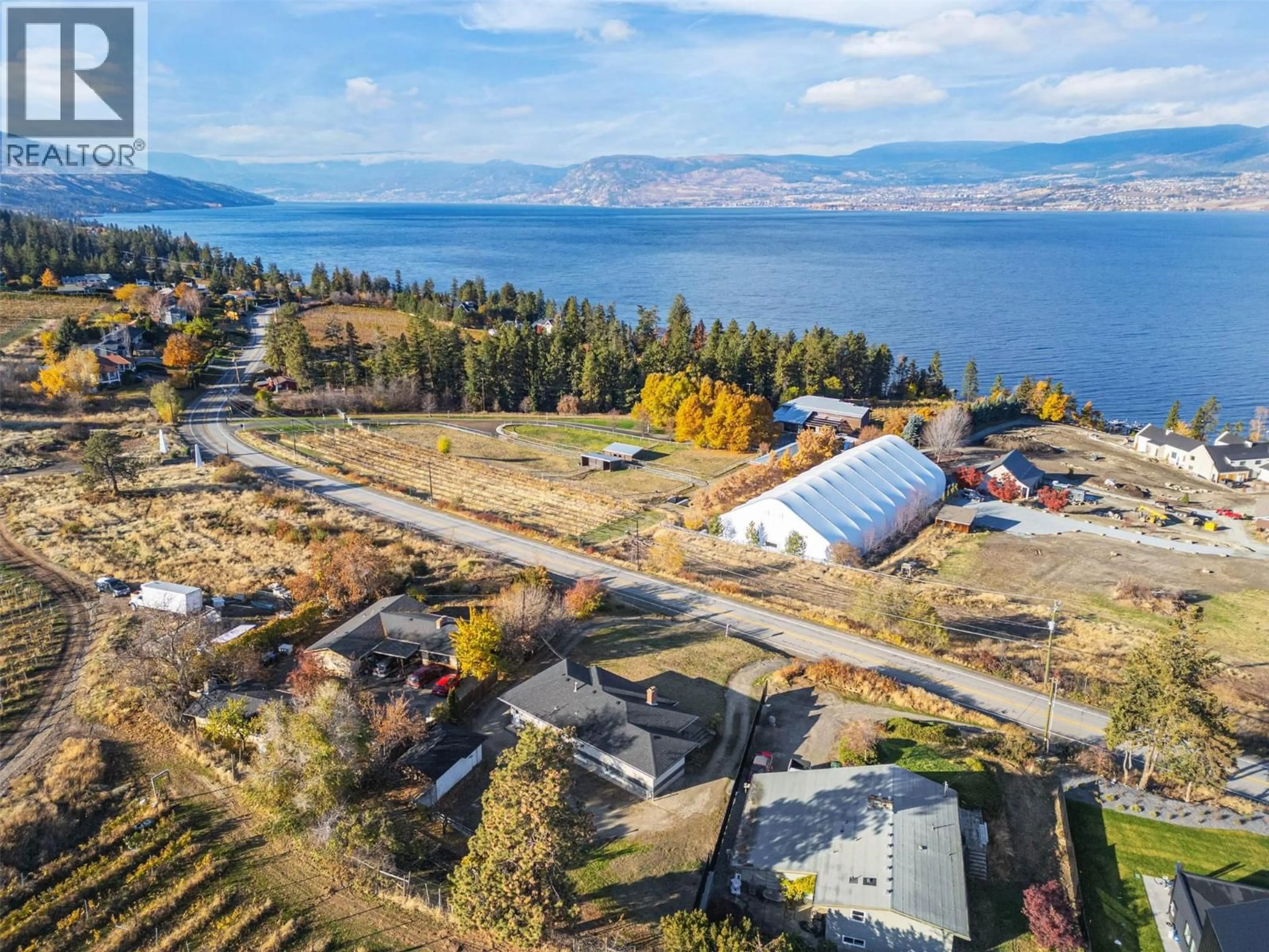 A pic from outside/outdoor area/front of a property/back of a property/a pic from drone, water/lake/river/ocean view for 4829 LAKESHORE ROAD, Kelowna British Columbia V1W4H6
