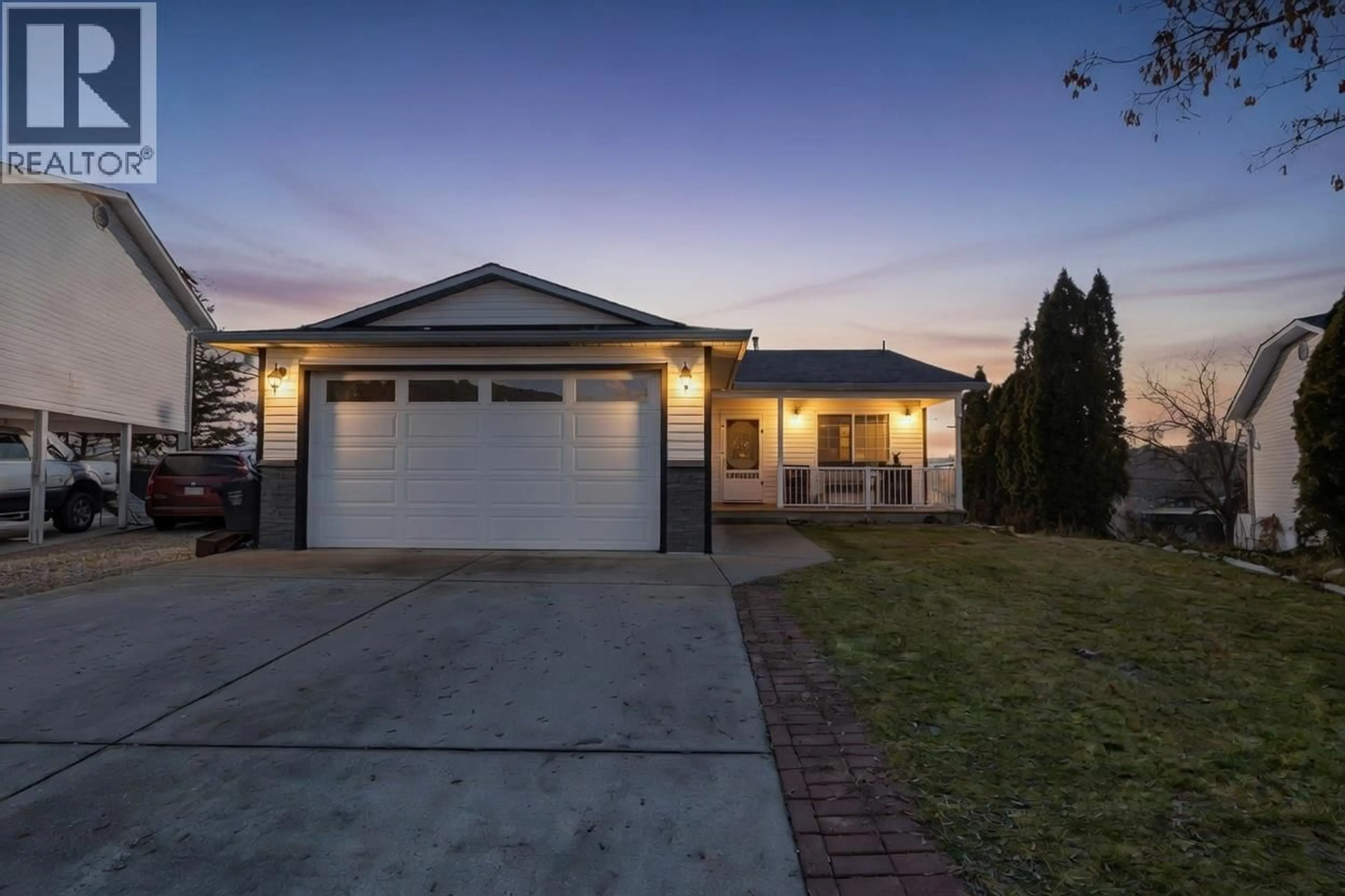 Home with vinyl exterior material, street for 10 - 6100 OLD VERNON ROAD, Kelowna British Columbia V1X7T8