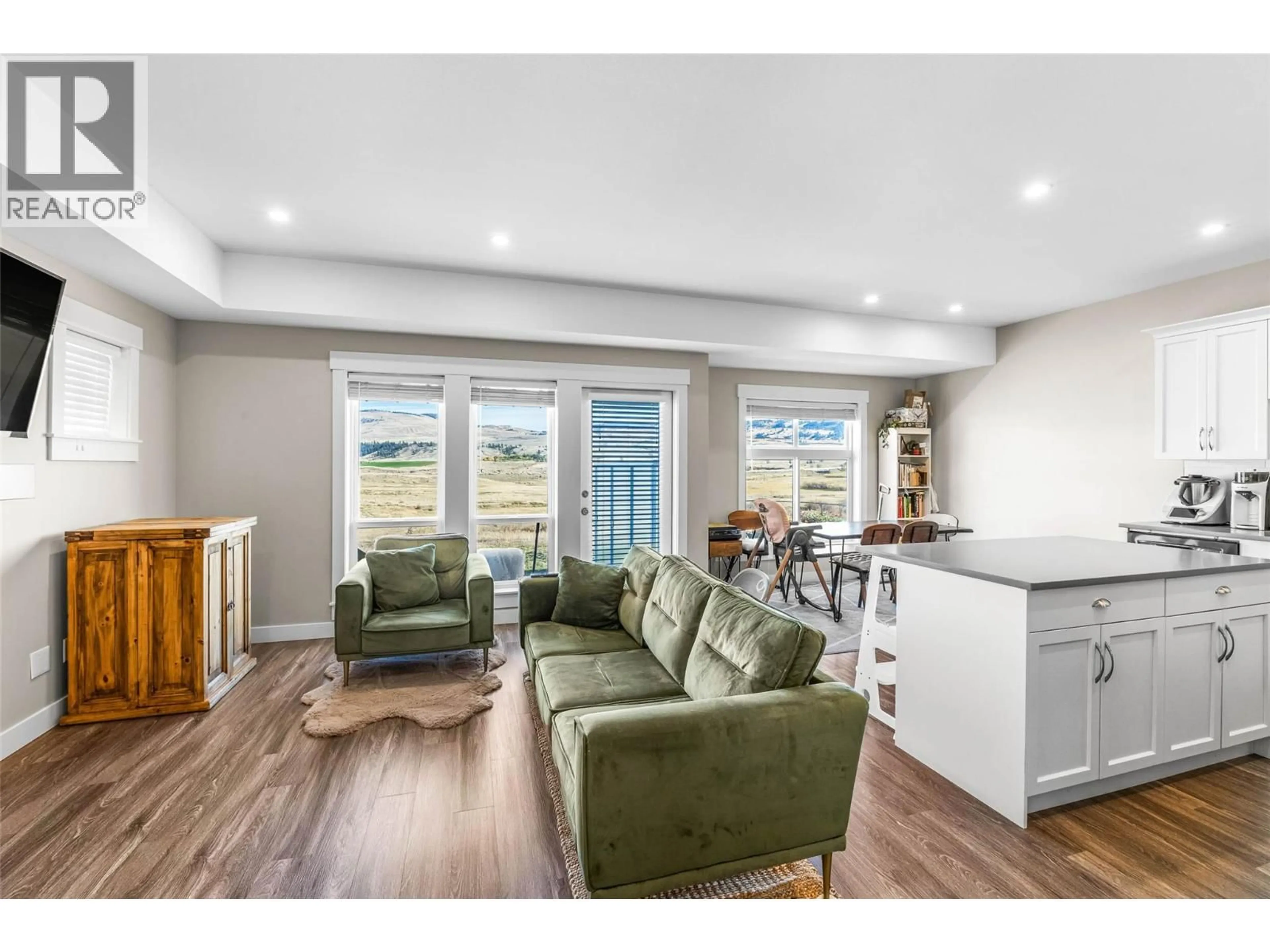 Living room with furniture, wood/laminate floor for 211 - 2514 SPRING BANK AVENUE, Merritt British Columbia V1K0B1