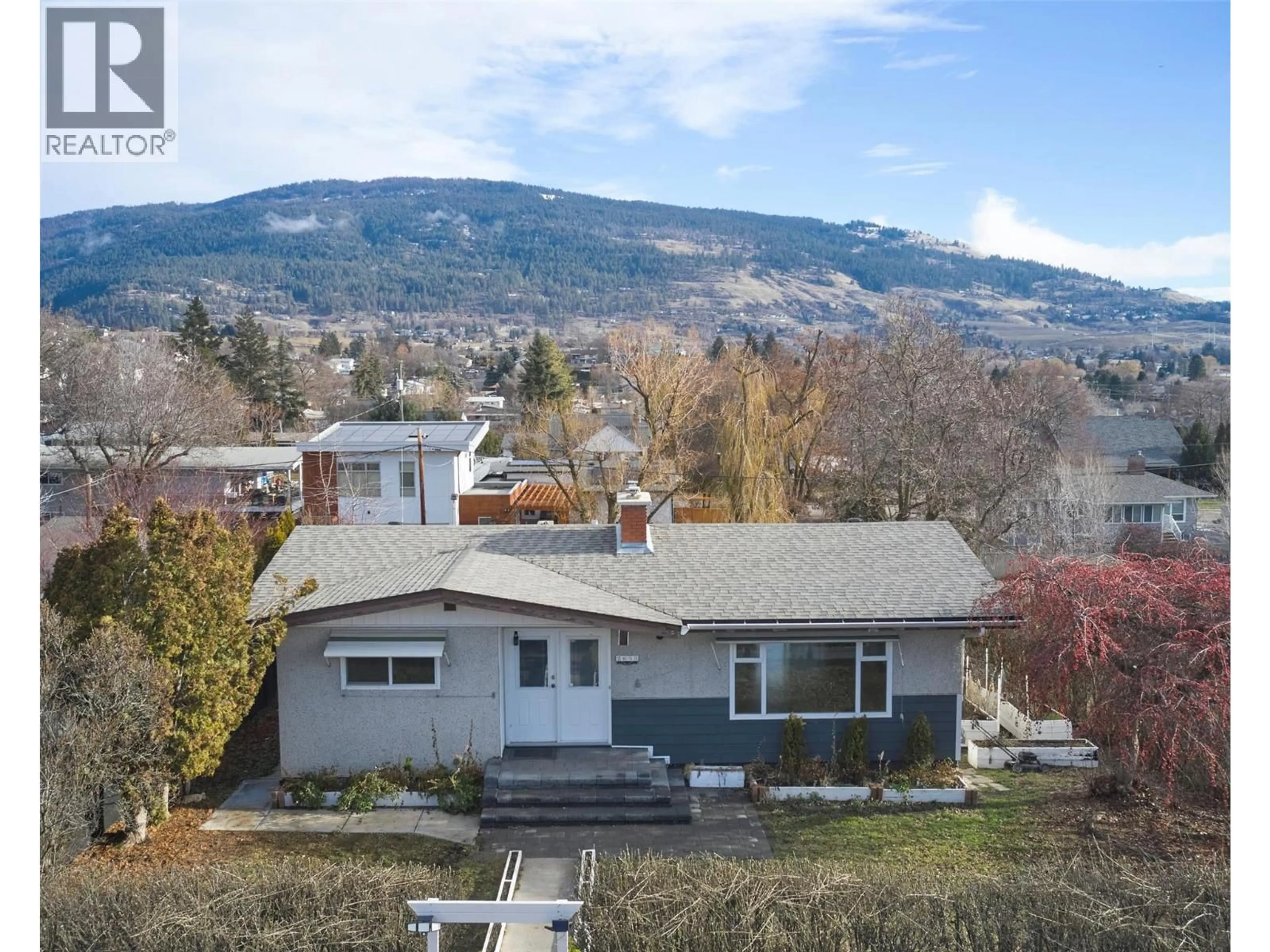 A pic from outside/outdoor area/front of a property/back of a property/a pic from drone, mountain view for 2603 18 STREET, Vernon British Columbia V1T4A3