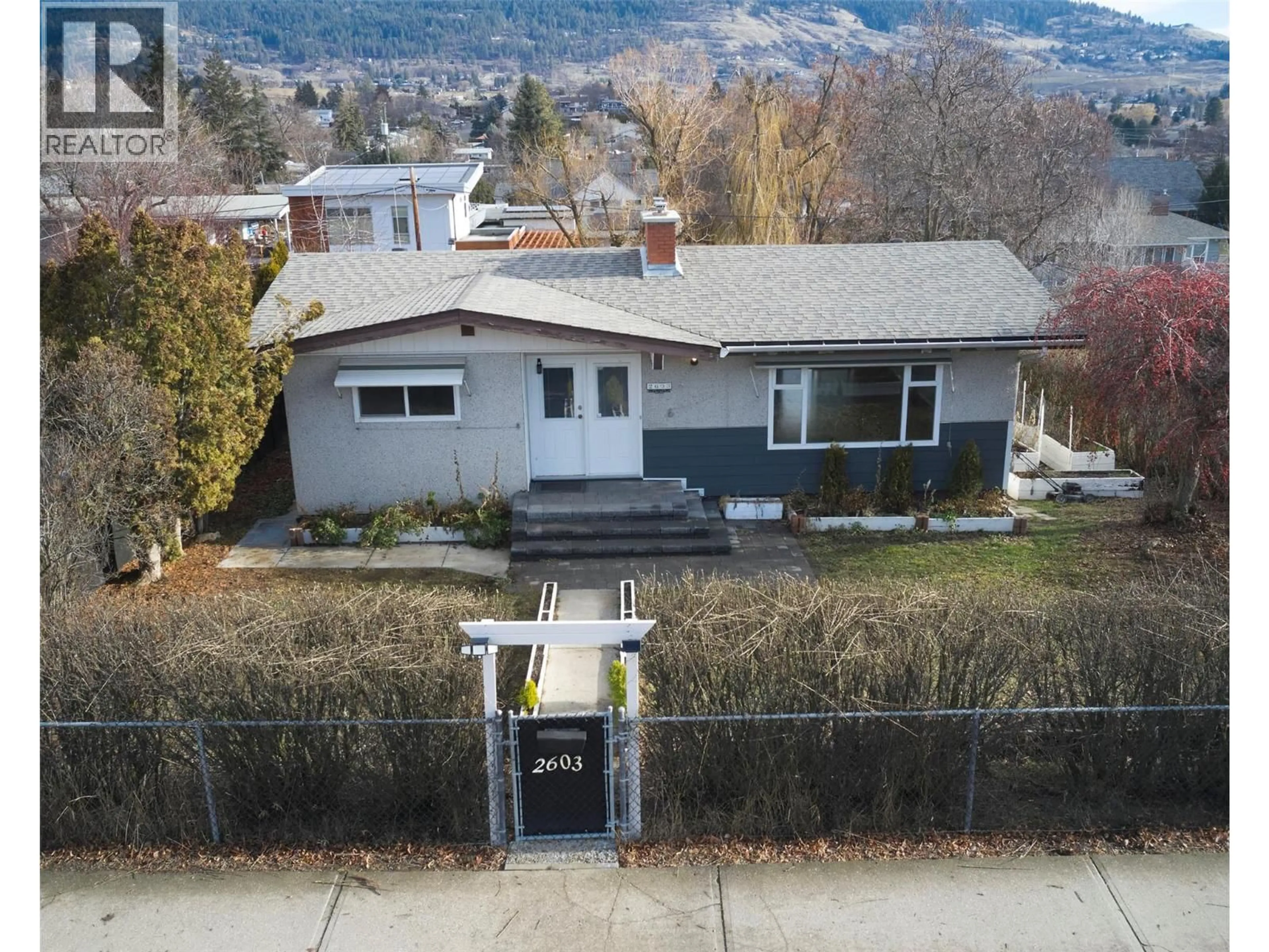 A pic from outside/outdoor area/front of a property/back of a property/a pic from drone, mountain view for 2603 18 STREET, Vernon British Columbia V1T4A3