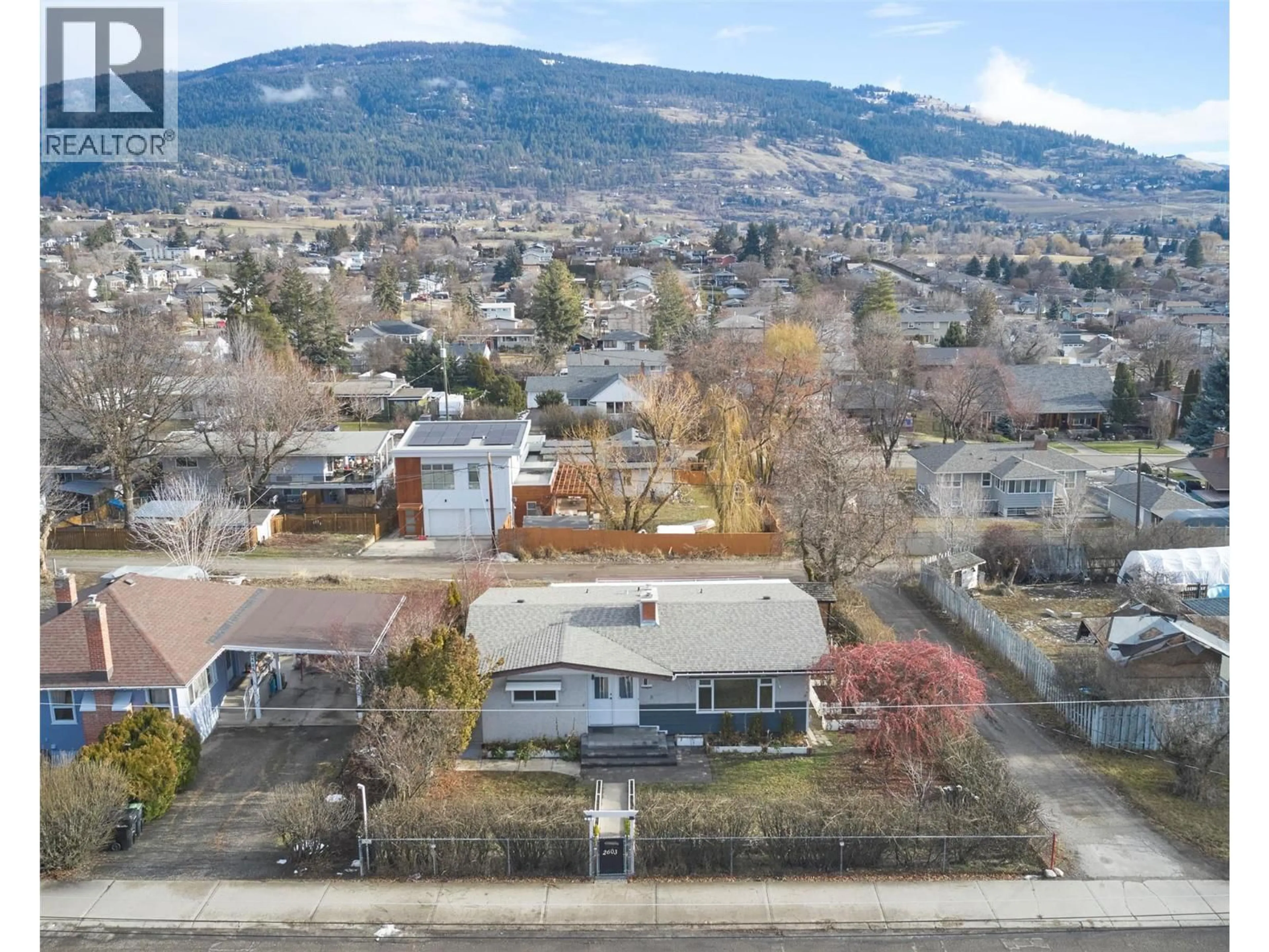 A pic from outside/outdoor area/front of a property/back of a property/a pic from drone, mountain view for 2603 18 STREET, Vernon British Columbia V1T4A3