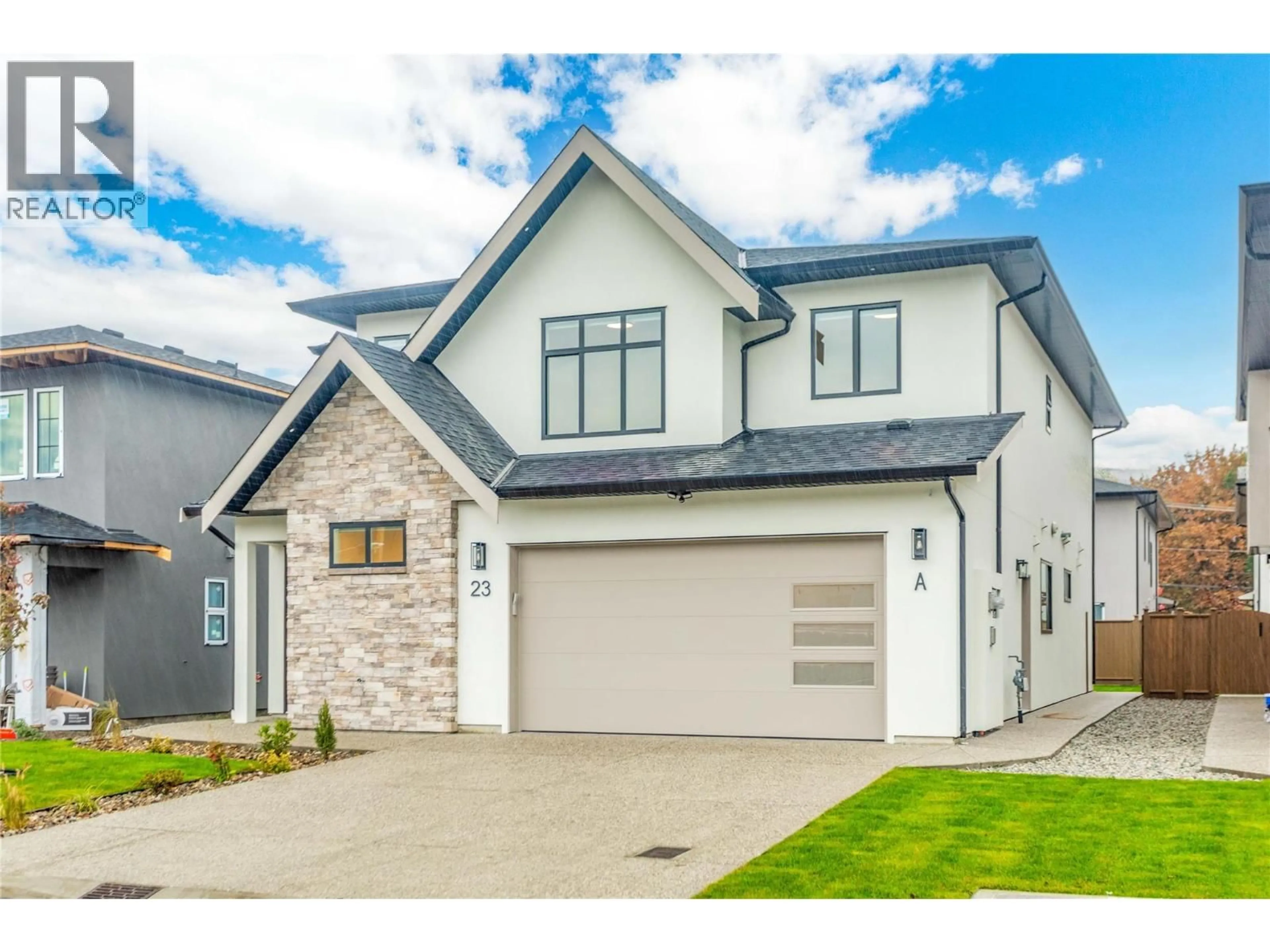 Home with vinyl exterior material, street for 23 - 19950 MCCARTHY ROAD, Lake Country British Columbia