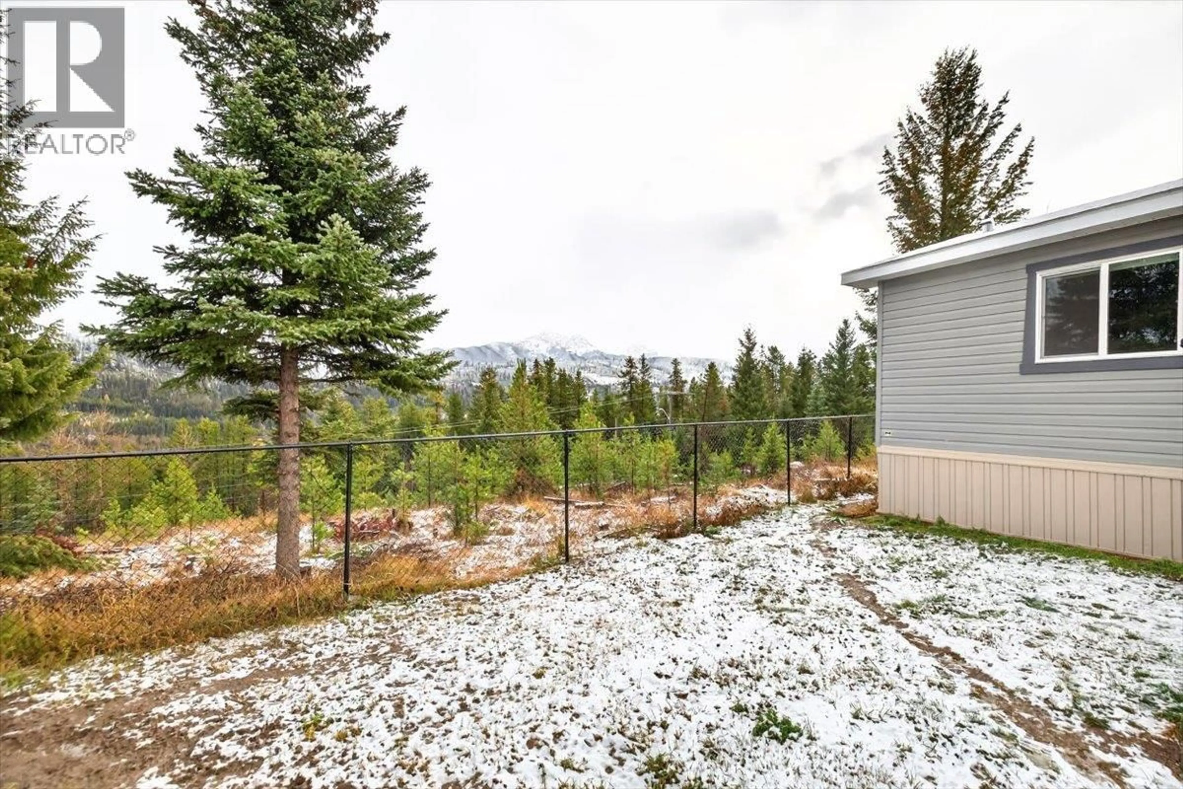 Patio, forest/trees view for 22 WILDERNESS HEIGHTS DRIVE, Elkford British Columbia V0B1H0