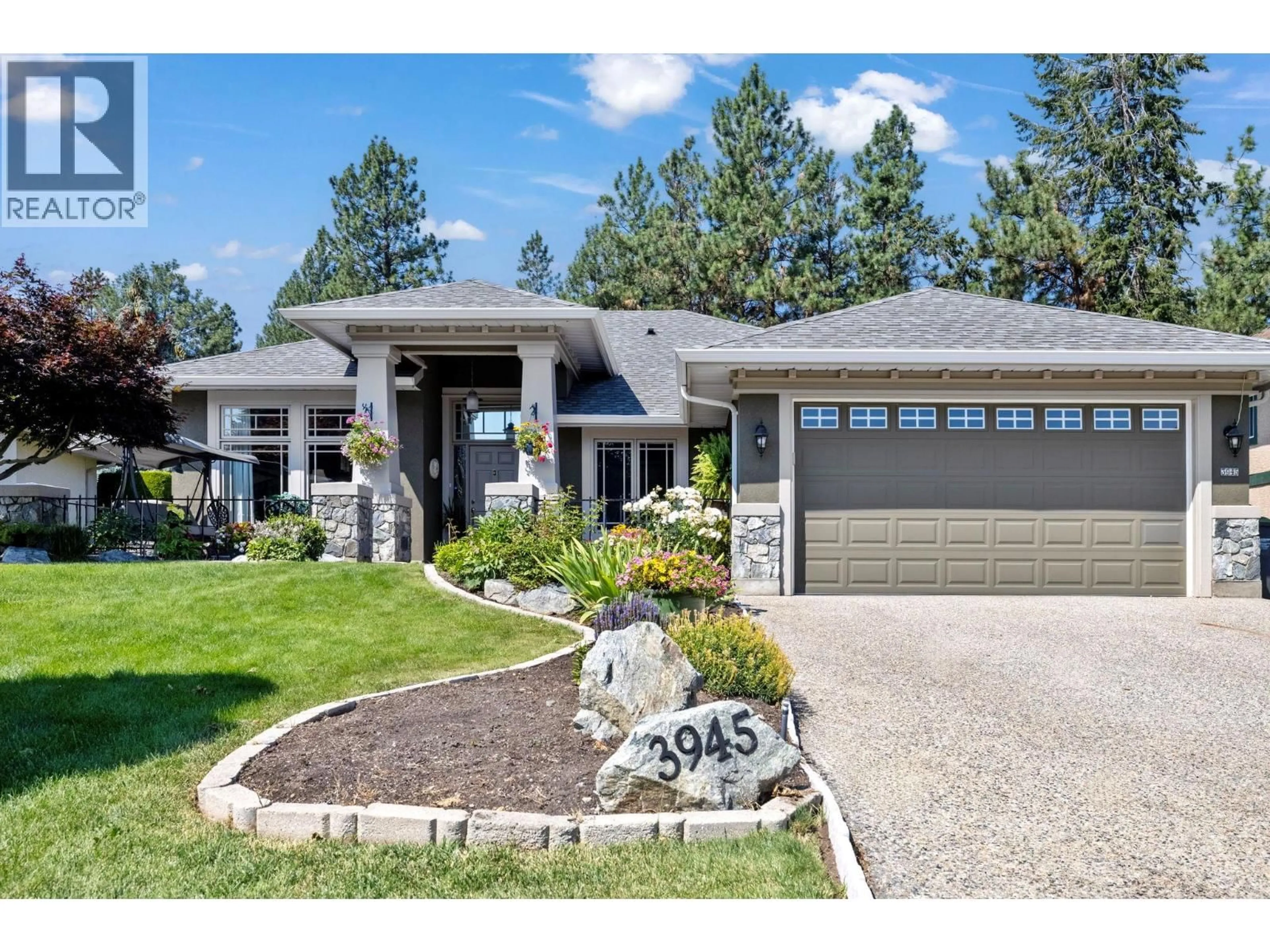 Home with brick exterior material, street for 3945 GALLAGHERS CIRCLE, Kelowna British Columbia V1W3Z9