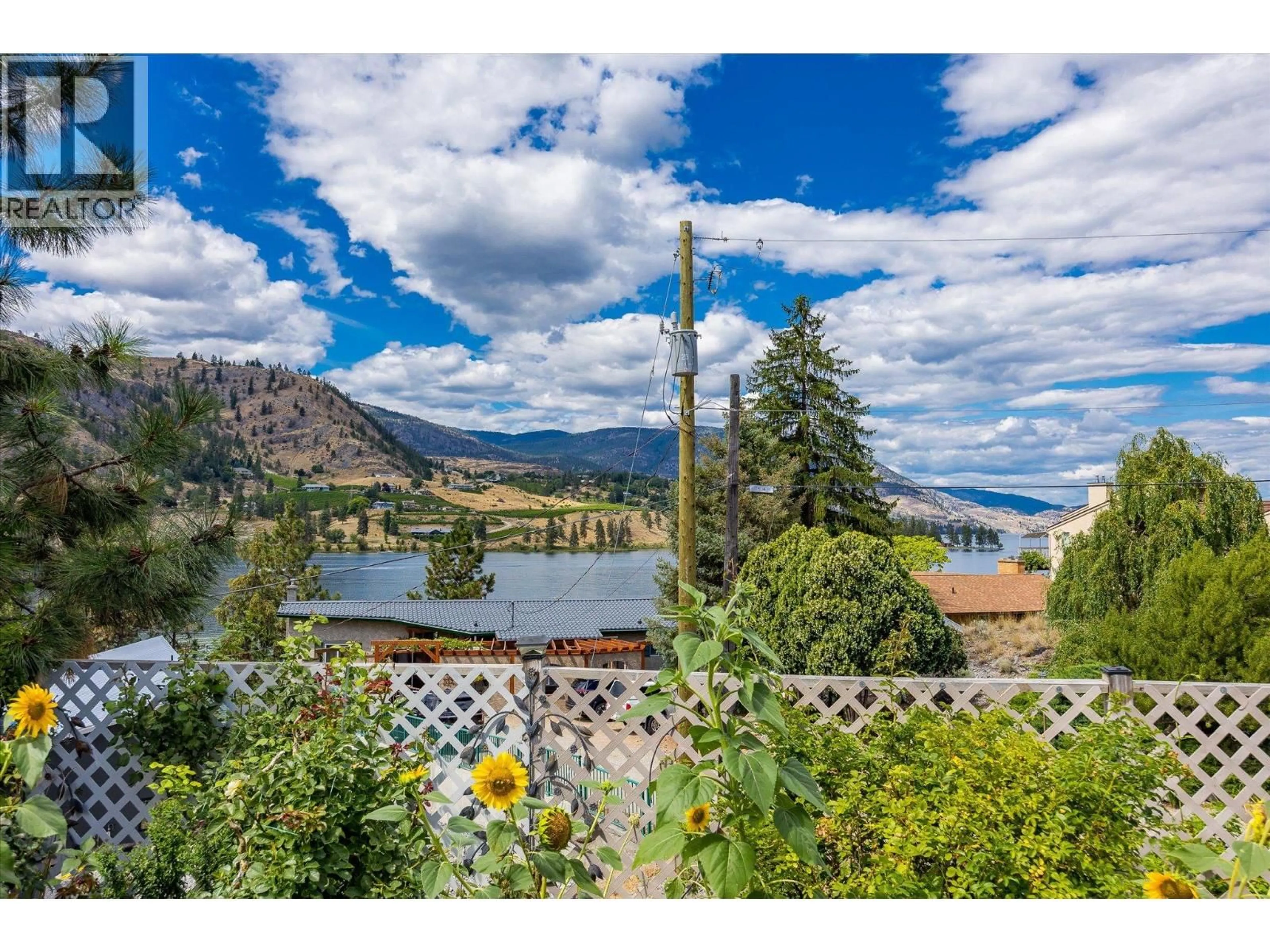 A pic from outside/outdoor area/front of a property/back of a property/a pic from drone, mountain view for 515 PHILPOTT ROAD, Okanagan Falls British Columbia V0H1R5