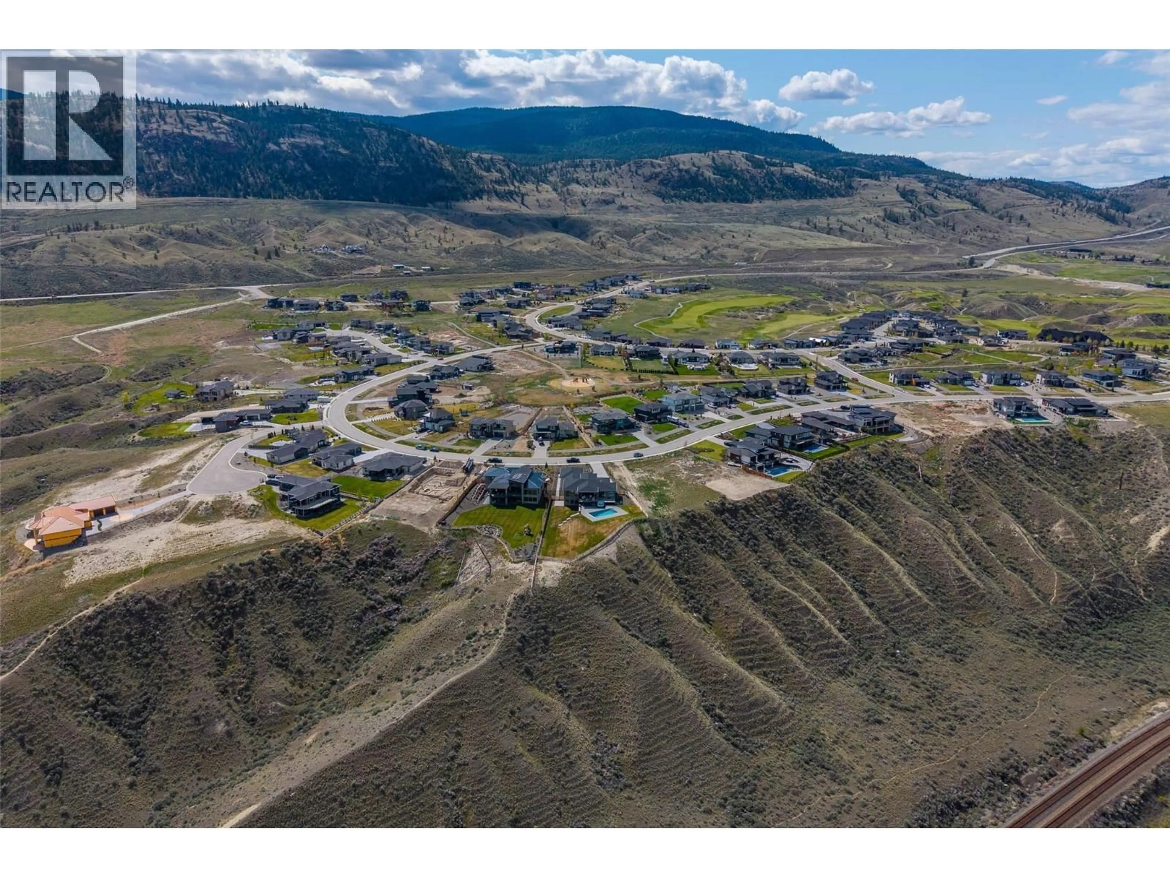 A pic from outside/outdoor area/front of a property/back of a property/a pic from drone, mountain view for 128 LAKE POINT COURT, Kamloops British Columbia V1S0G2