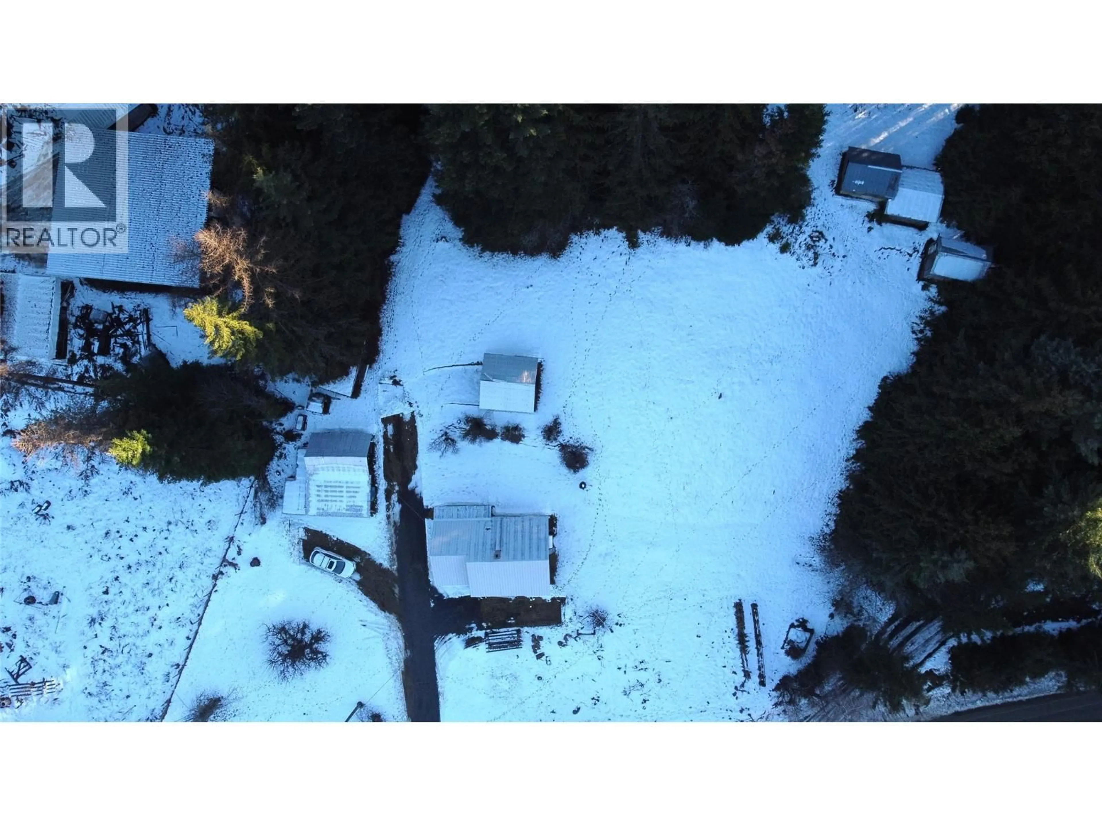 A pic from outside/outdoor area/front of a property/back of a property/a pic from drone, street for 4207 BLEWETT ROAD, Nelson British Columbia V1L6X2