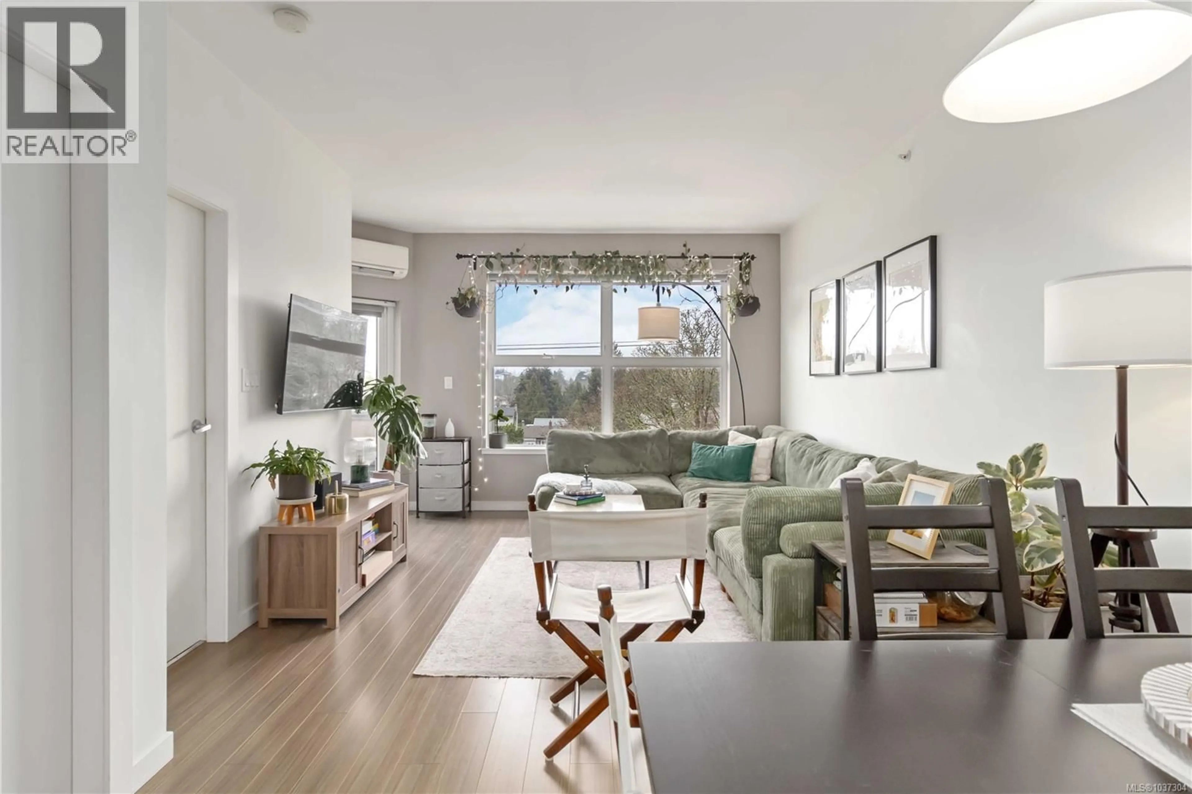 Living room with furniture, wood/laminate floor for 420 - 2871 JACKLIN ROAD, Langford British Columbia V9B5R8