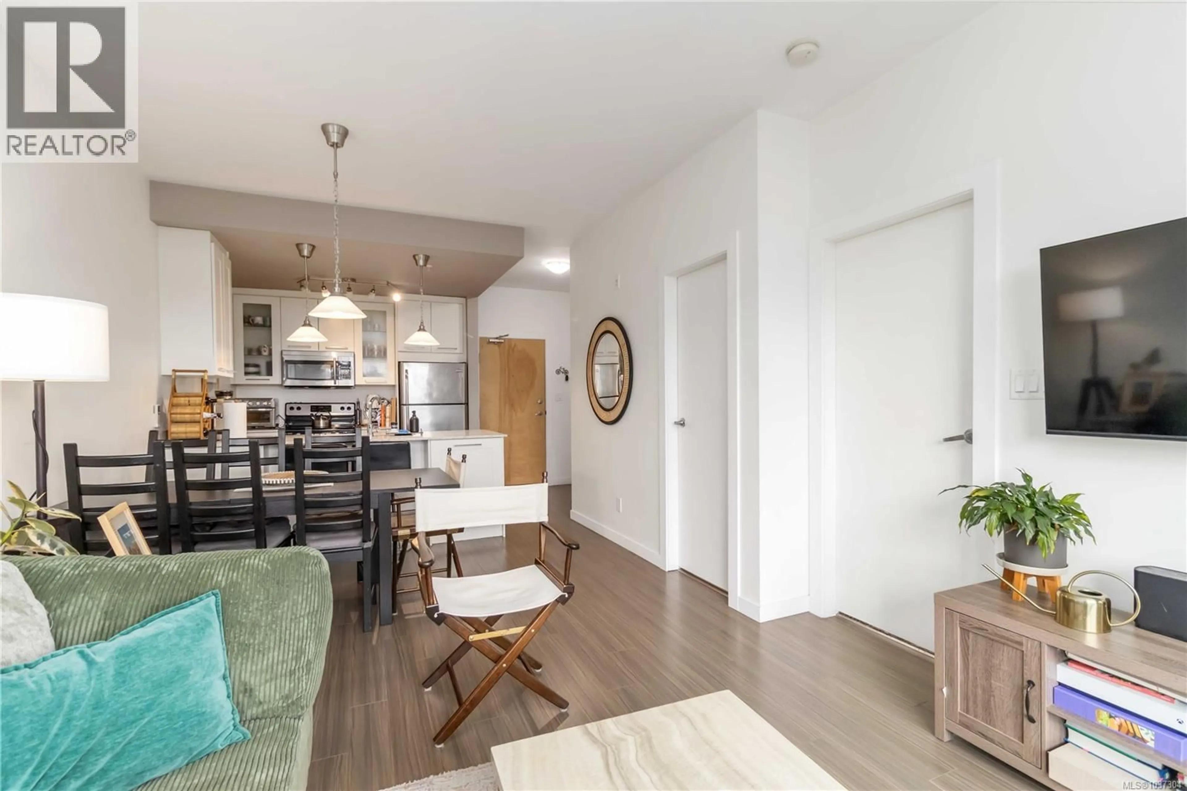 Open concept kitchen, wood/laminate floor for 420 - 2871 JACKLIN ROAD, Langford British Columbia V9B5R8