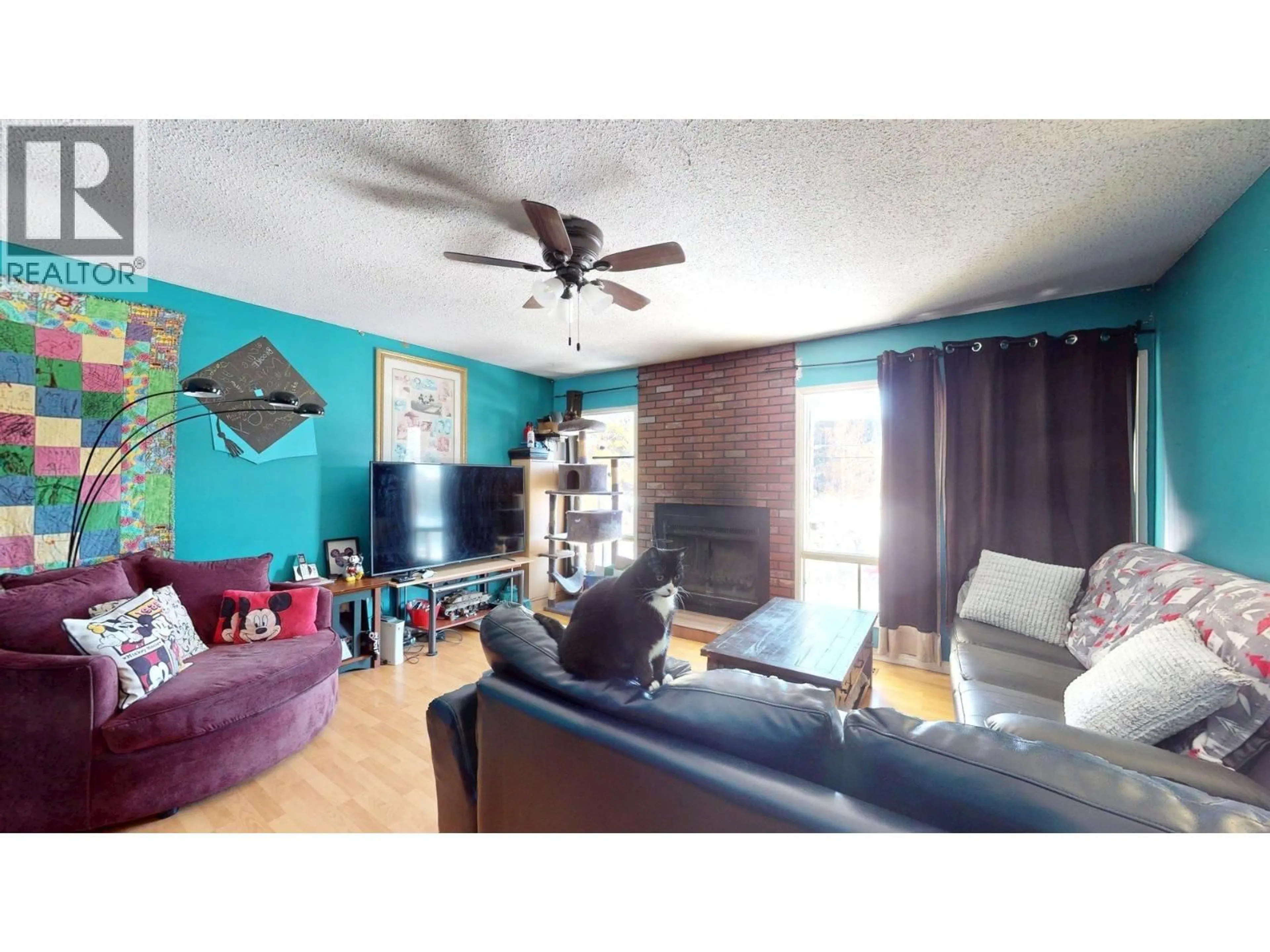 Living room with furniture, wood/laminate floor for 1315 ALPINE DRIVE, Elkford British Columbia V0B1H0