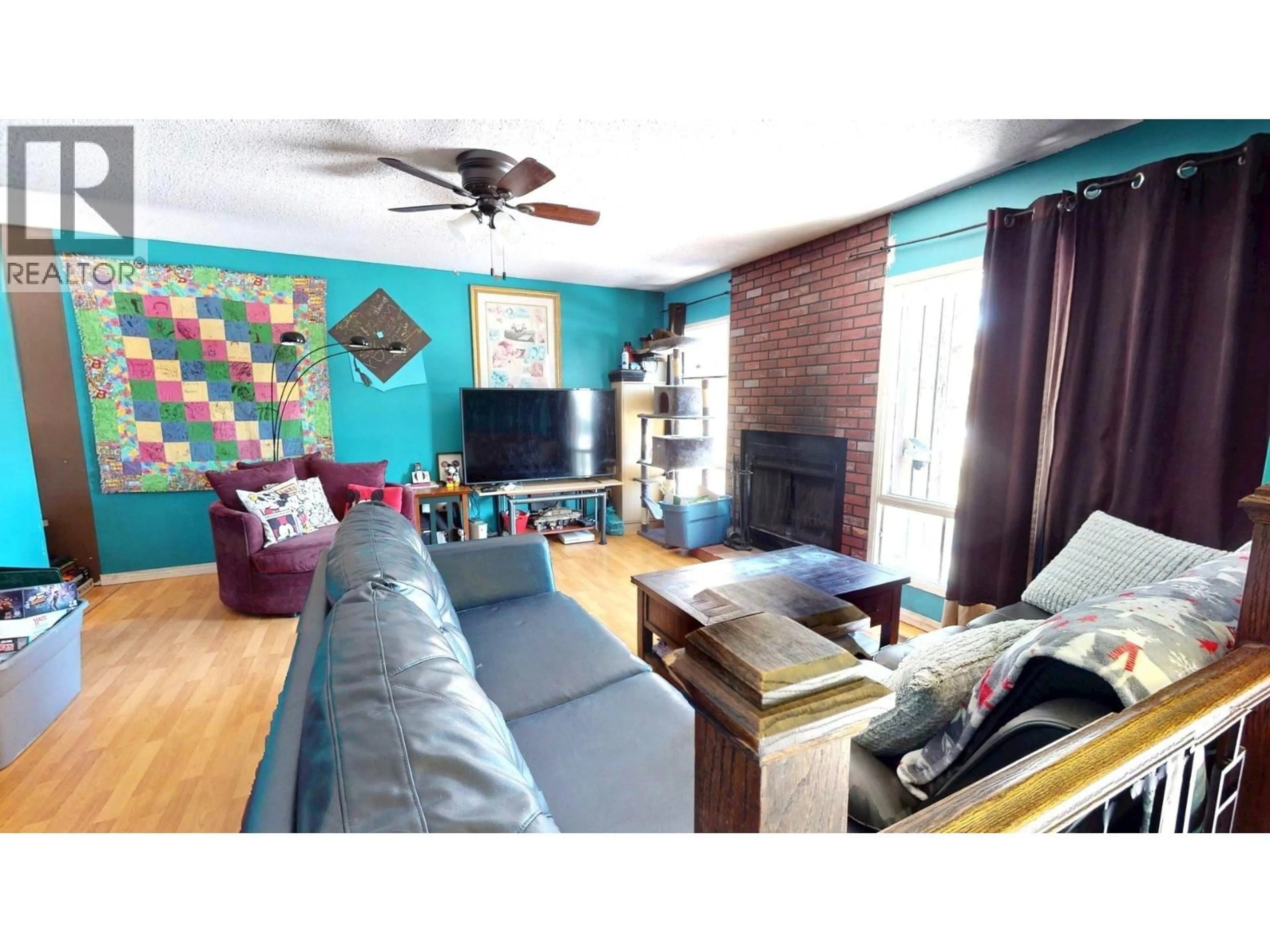 Living room with furniture, wood/laminate floor for 1315 ALPINE DRIVE, Elkford British Columbia V0B1H0