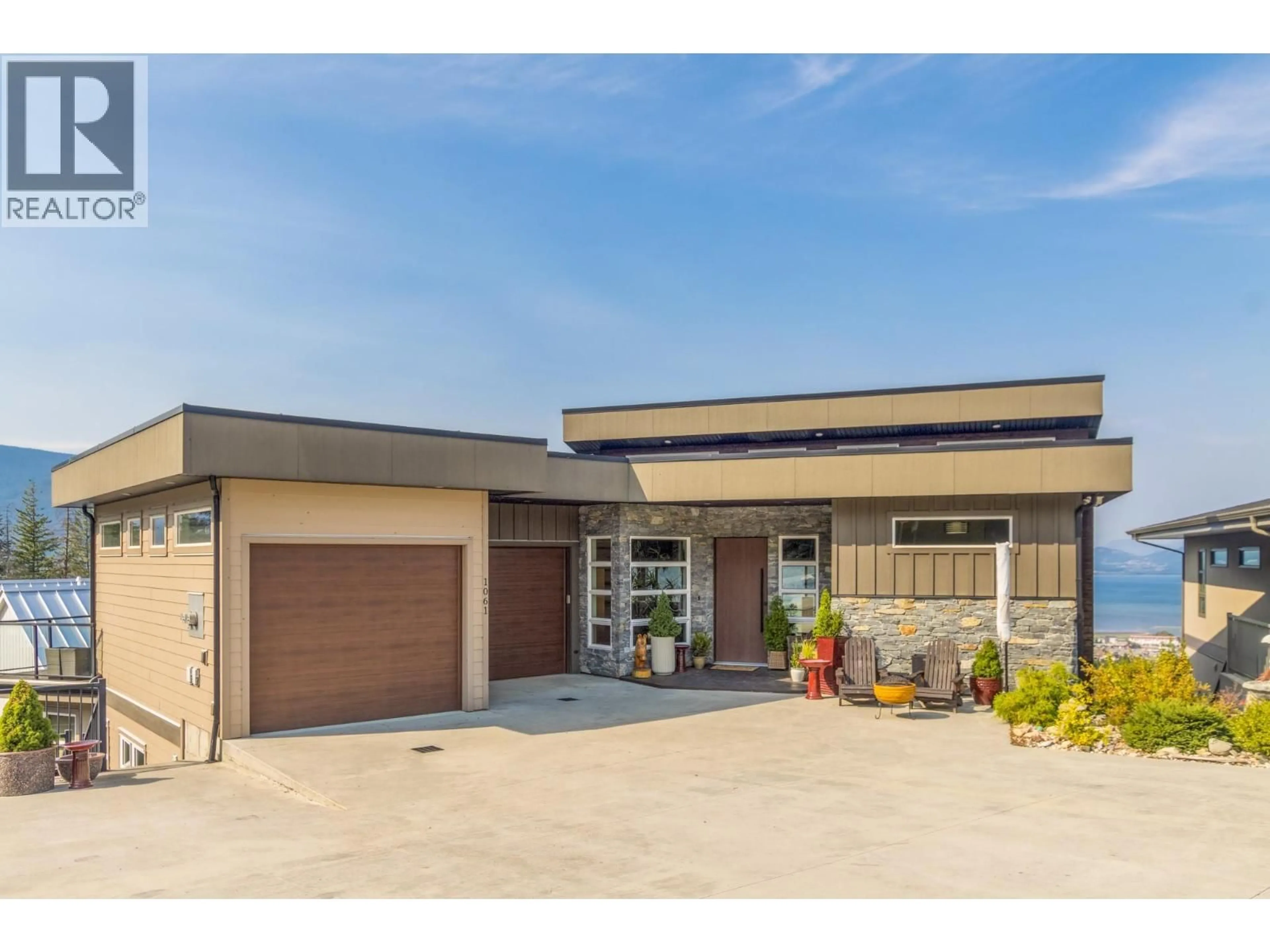 Home with brick exterior material, street for 1061 19 AVENUE SOUTHEAST, Salmon Arm British Columbia V1E0E6