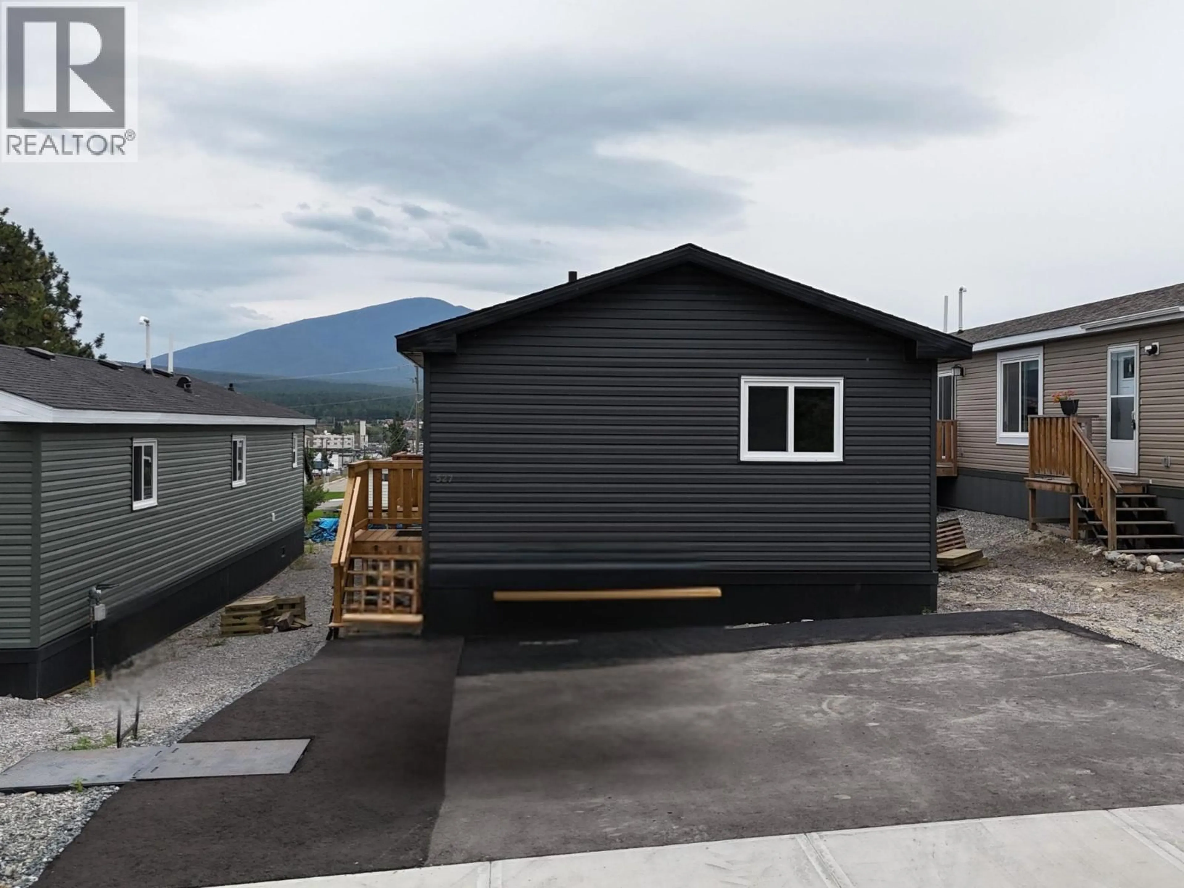 Home with vinyl exterior material, mountain view for 527 PAGURUT AVENUE WEST, Cranbrook British Columbia V1C0G5