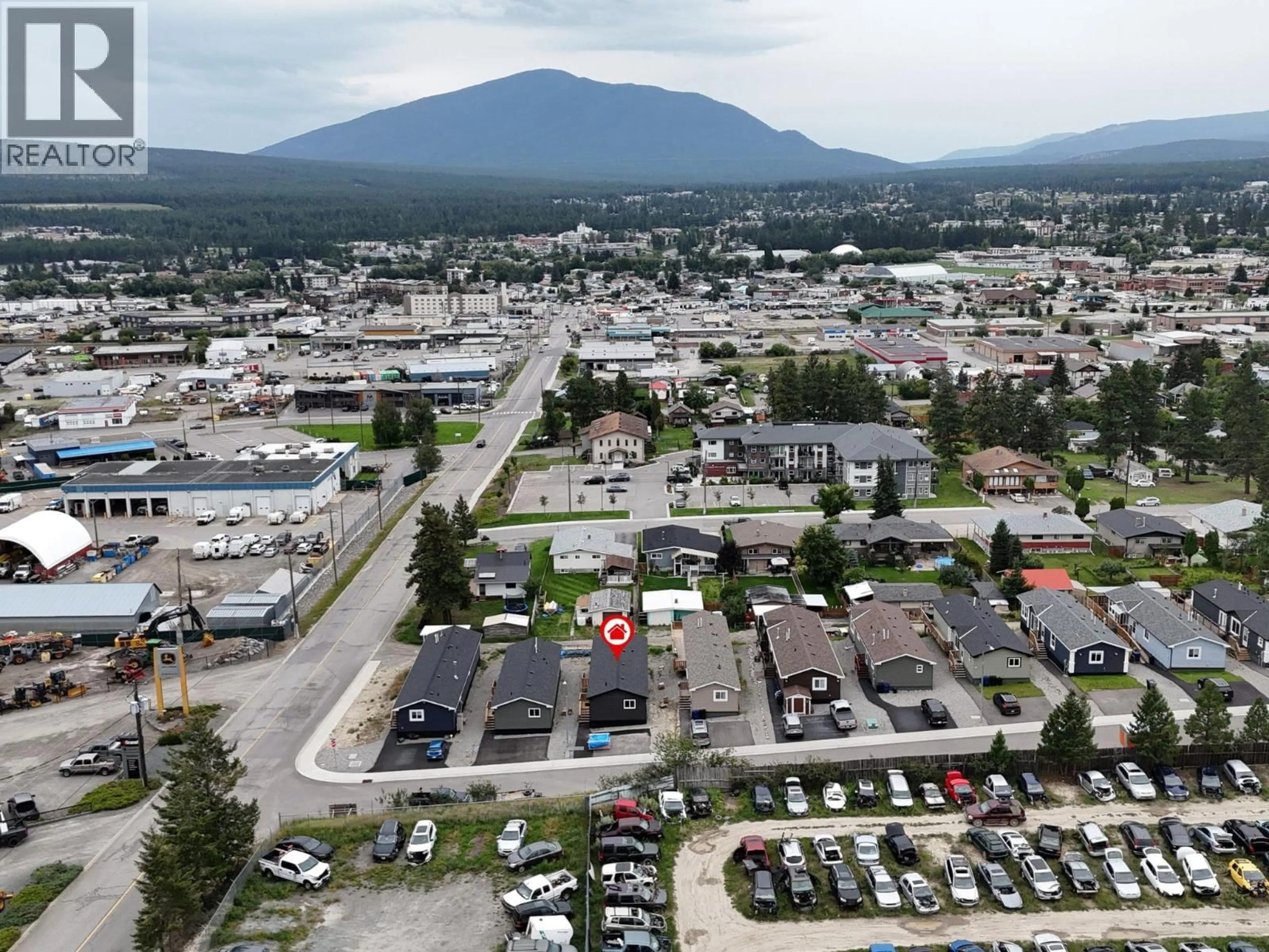 A pic from outside/outdoor area/front of a property/back of a property/a pic from drone, mountain view for 527 PAGURUT AVENUE WEST, Cranbrook British Columbia V1C0G5